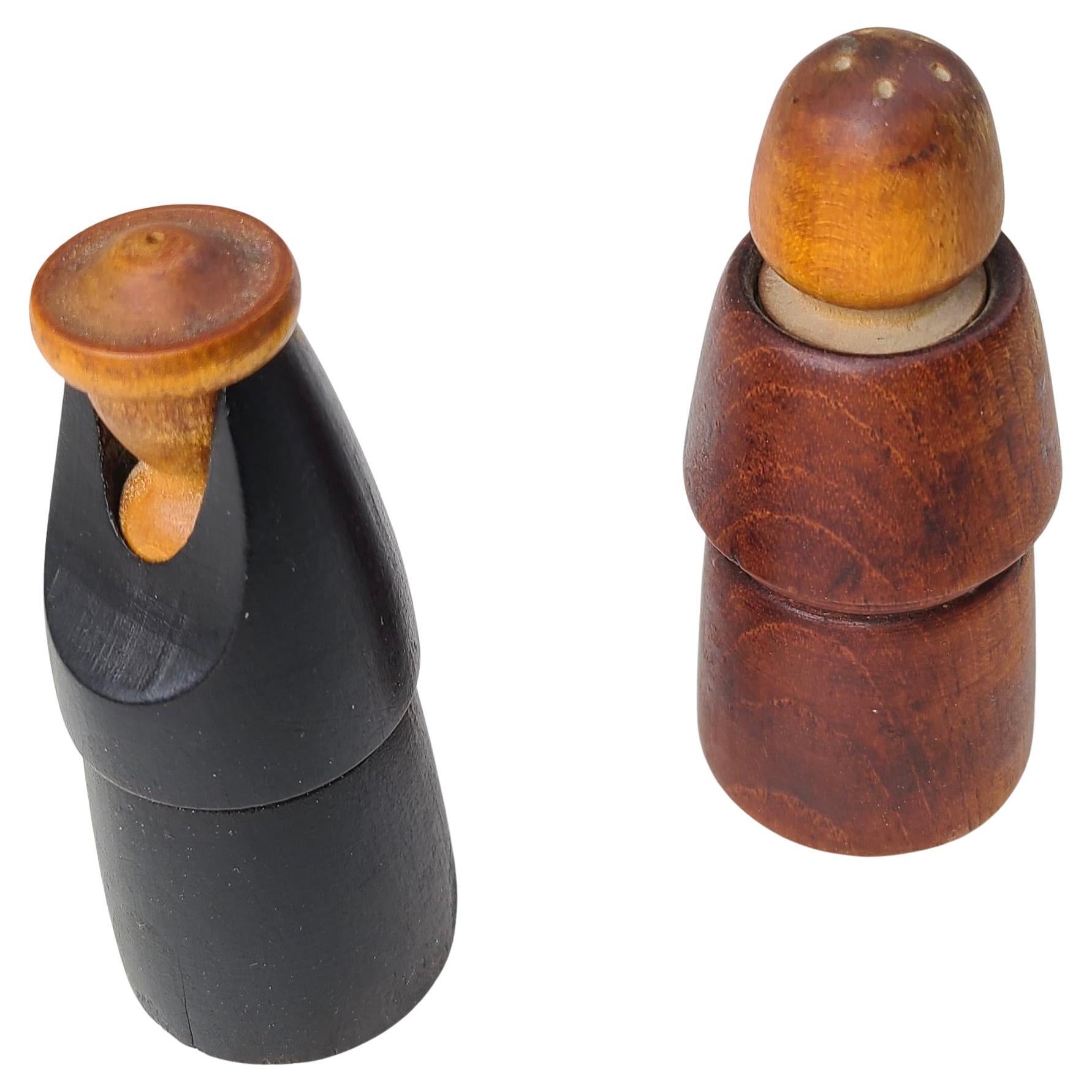 Pair Mid-Century Modern Salt and Pepper Shakers.
Likely Danish design.
