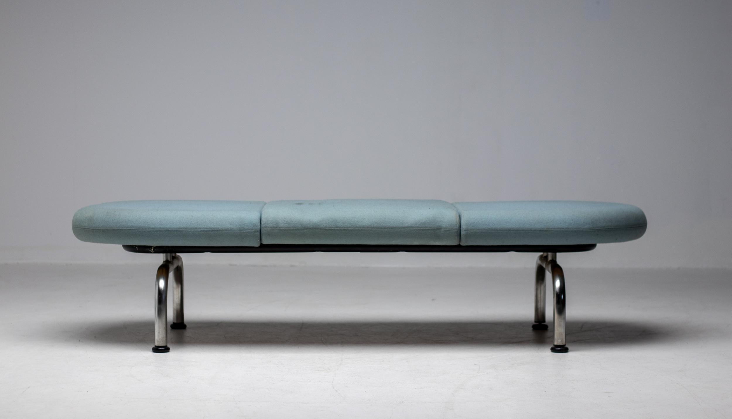 Stunning and rare Pipeline Bench by Erik Ole Jørgensen for Georg Jørgensen & Søn, Denmark, 1960.
The tubular legs are made in stainless steel and the top is upholstered in a grey/green Kvadrat fabric.
The foam is not resilient anymore and the fabric