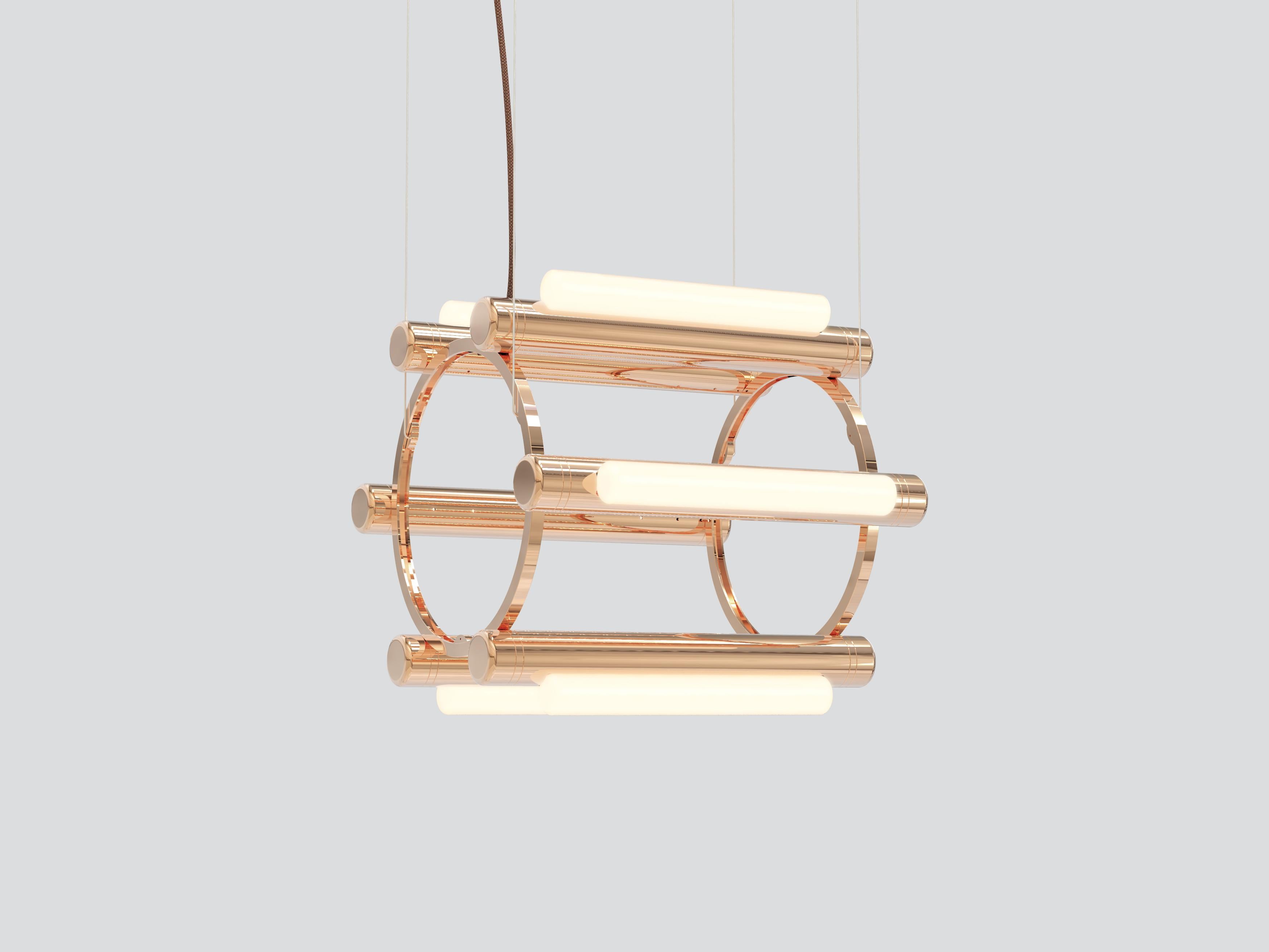 Pipeline chandelier 1
Design: Caine Heintzman, Editor: ANDLight

By definition, the Pipeline chandelier features a cylindrical arrangement of linear illuminated sections cinched by metal hoops. Its carousel like form proposes an unconventional