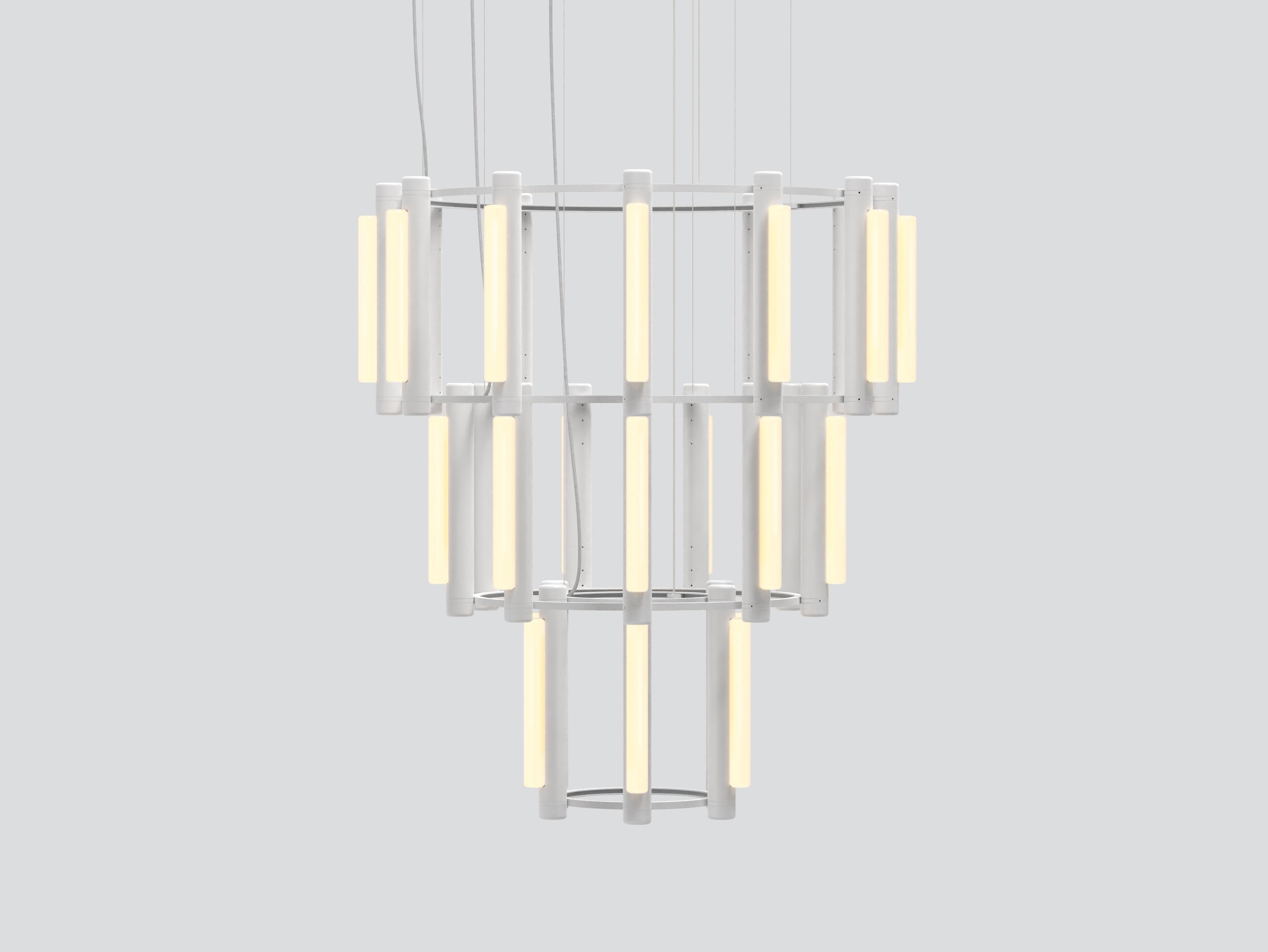 PIPELINE CHANDELIER 10 – PENDANT
by CAINE HEINTZMAN 

MATERIALS
– Aluminum Body
– Cast Acrylic

ELECTRICAL
– 27 x 5W LED
– 47,000 hour Lifetime
– 90+ CRI
– Input Voltage 100–240V + 277V
– Integral 24V DC power supply included 
– Dimming