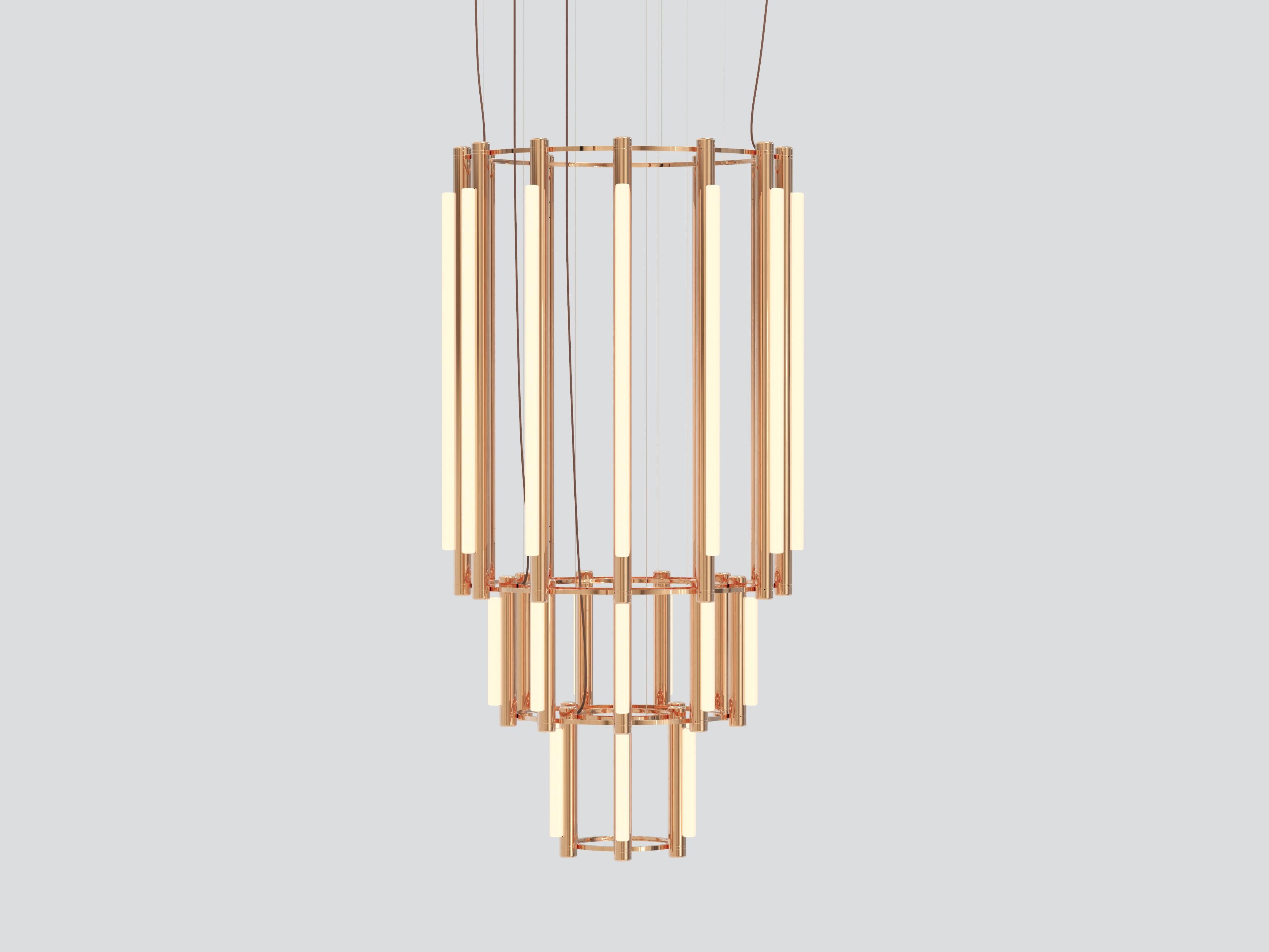 PIPELINE CHANDELIER 11 – PENDANT
by CAINE HEINTZMAN 

MATERIALS
– Aluminum Body
– Cast Acrylic

ELECTRICAL
– 12 x 15W + 15 x 5W LED
– 47,000 hour Lifetime
– 90+ CRI
– Input Voltage 100–240V + 277V
– Integral 24V DC power supply included
