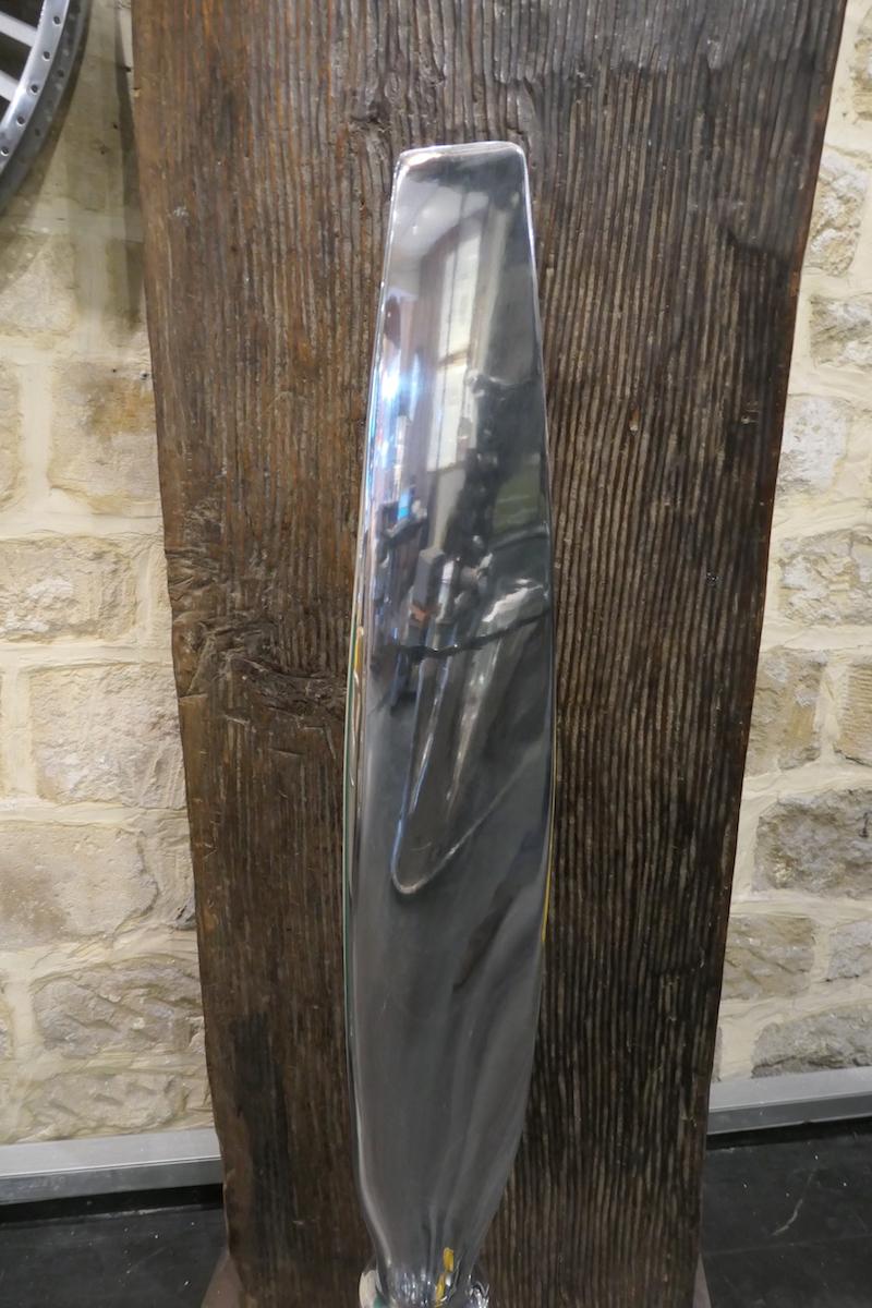 Piper Cheyenne airplane propeller blade presented on a stainless steel stand highly polished to mirror effect. Very decorative as modernist sculpture, for display or collection use only.