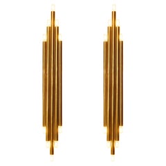 "Pipes" wall sconces in brass by Studio Glustin