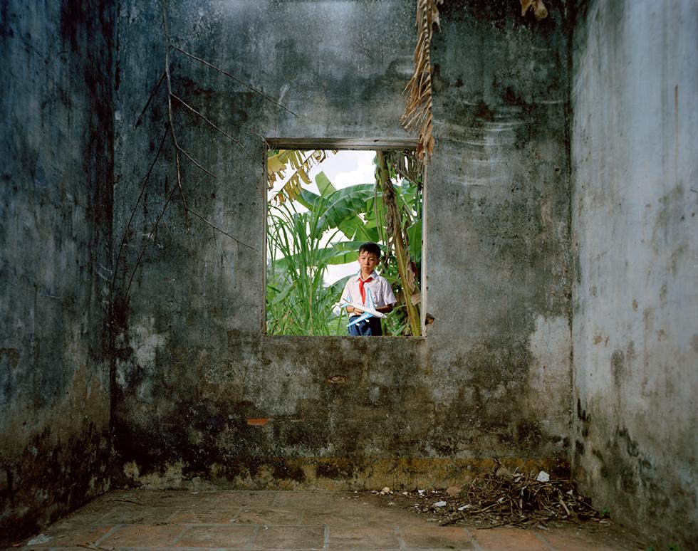Pipo Nguyen-Duy Portrait Photograph - Boy with Plane