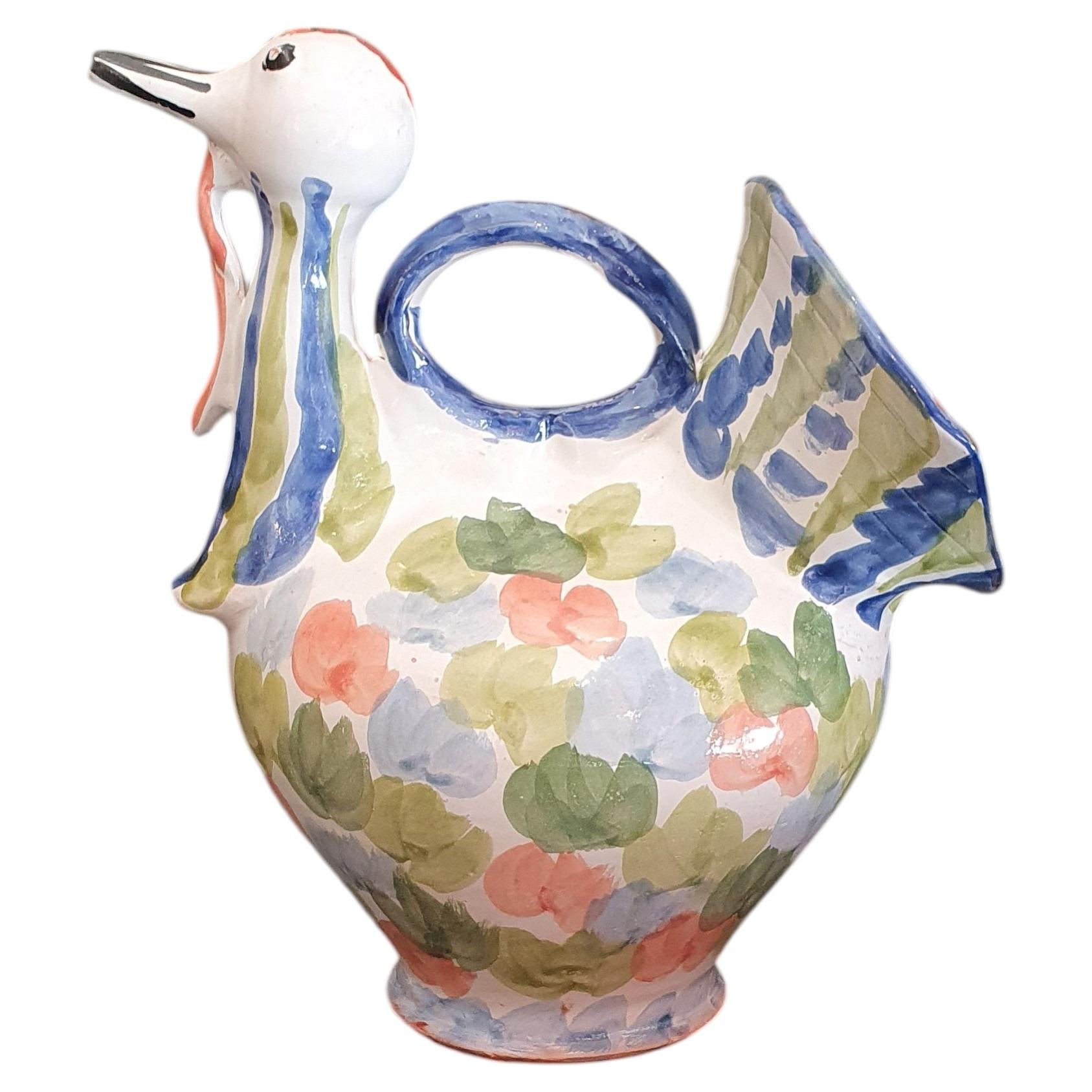 Pipo or bucaro in ceramic in the shape of a glazed and enameled dove. For Sale