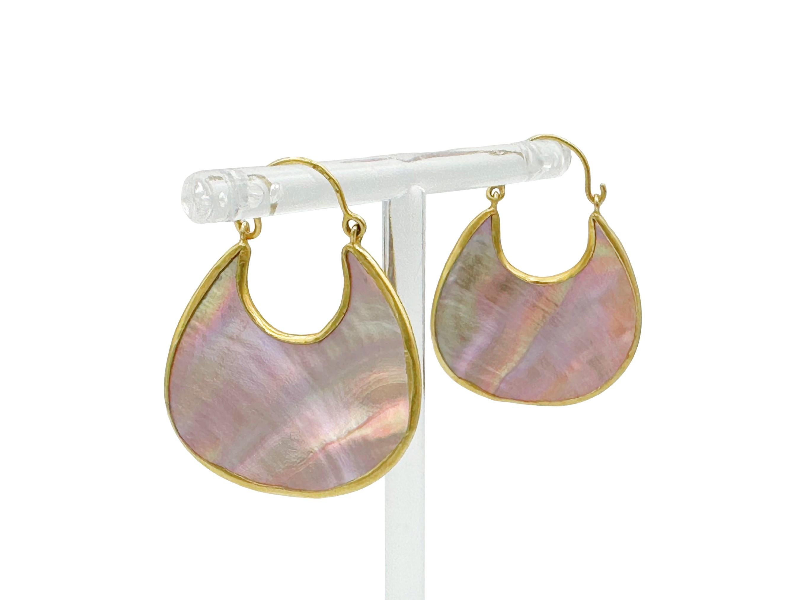 Wear a piece of luxe with these stunning handmade Pippa Small 18K yellow gold earrings, crafted in 18K yellow gold and natural mother-of-pearl. The iridescent mother-of-pearl is lustrous and flashes a gorgeous play of color including pinks, greens