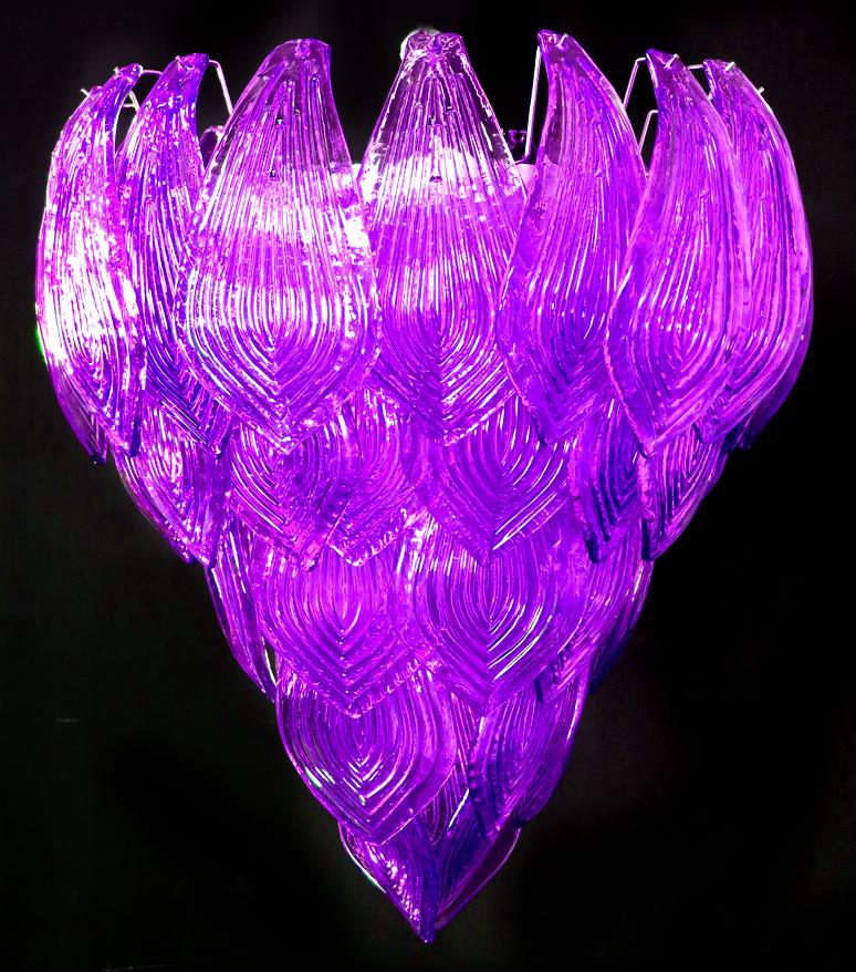 Beautiful and huge pair of Italian murano chandeliers composed of 52 splendid purple glasses that give a very elegant look. The glasses of this chandelier are real works of art, the weight of this chandelier is 50 kg.
Period: late 20th