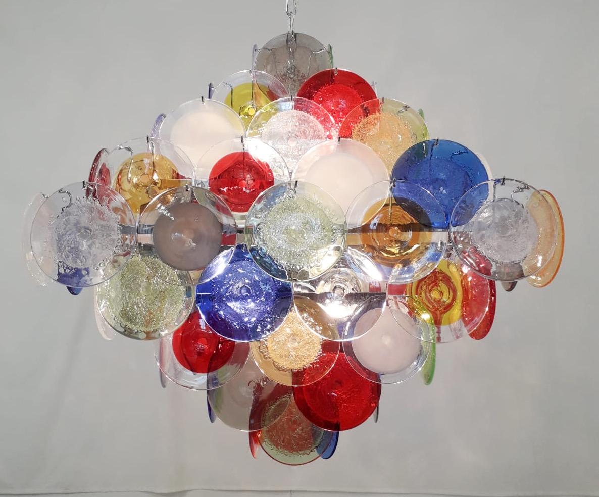 Italian chandelier with multicolored Murano glass discs mounted on chrome finish metal frame by Fabio Ltd / Made in Italy
12 lights / E26 or E27 type / max 60W each
Measures: Length 30 inches, width 30 inches, height 30 inches plus chain and