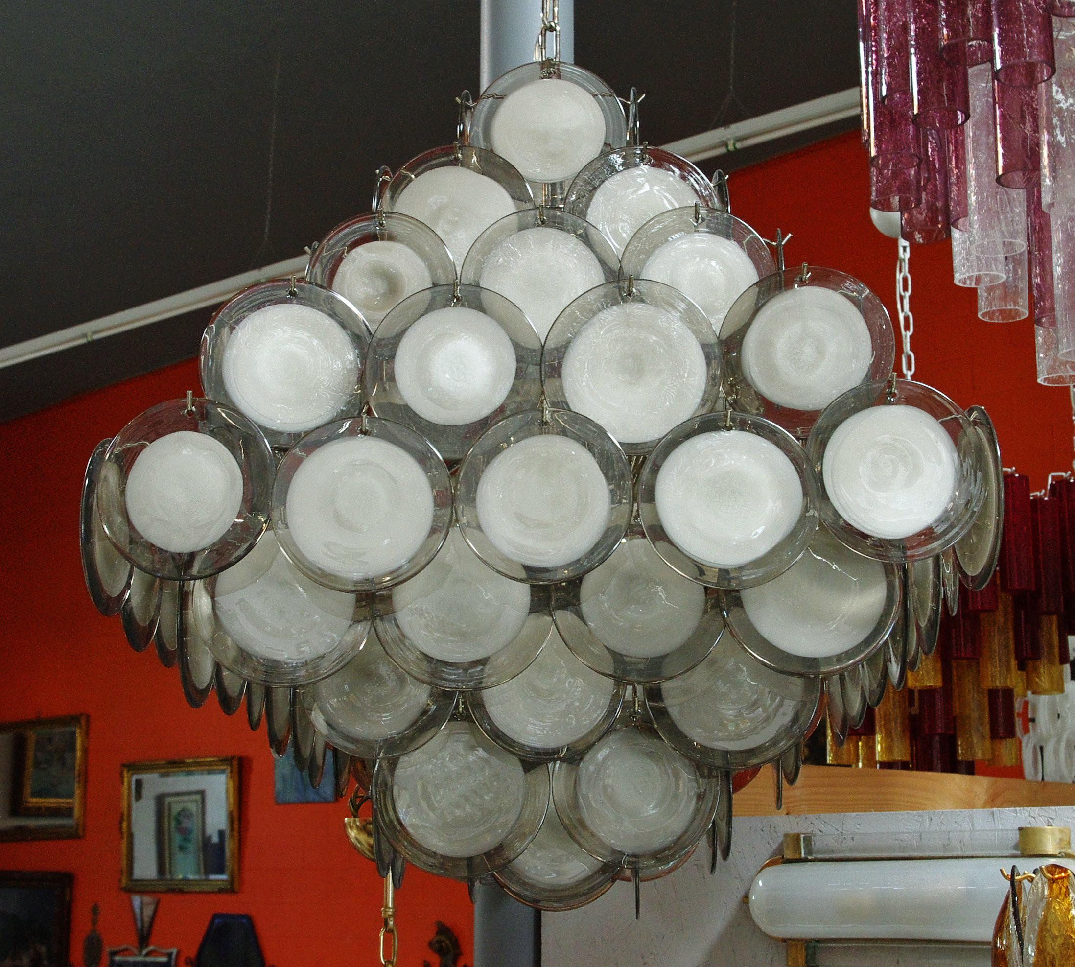 Italian chandelier with smoky and white infused Murano glass discs mounted on chrome frame by Fabio Ltd / Made in Italy
12 lights / E26 or E27 type / max 60W each
Measures: Length 30 inches, width 30 inches, height 30 inches plus chain and