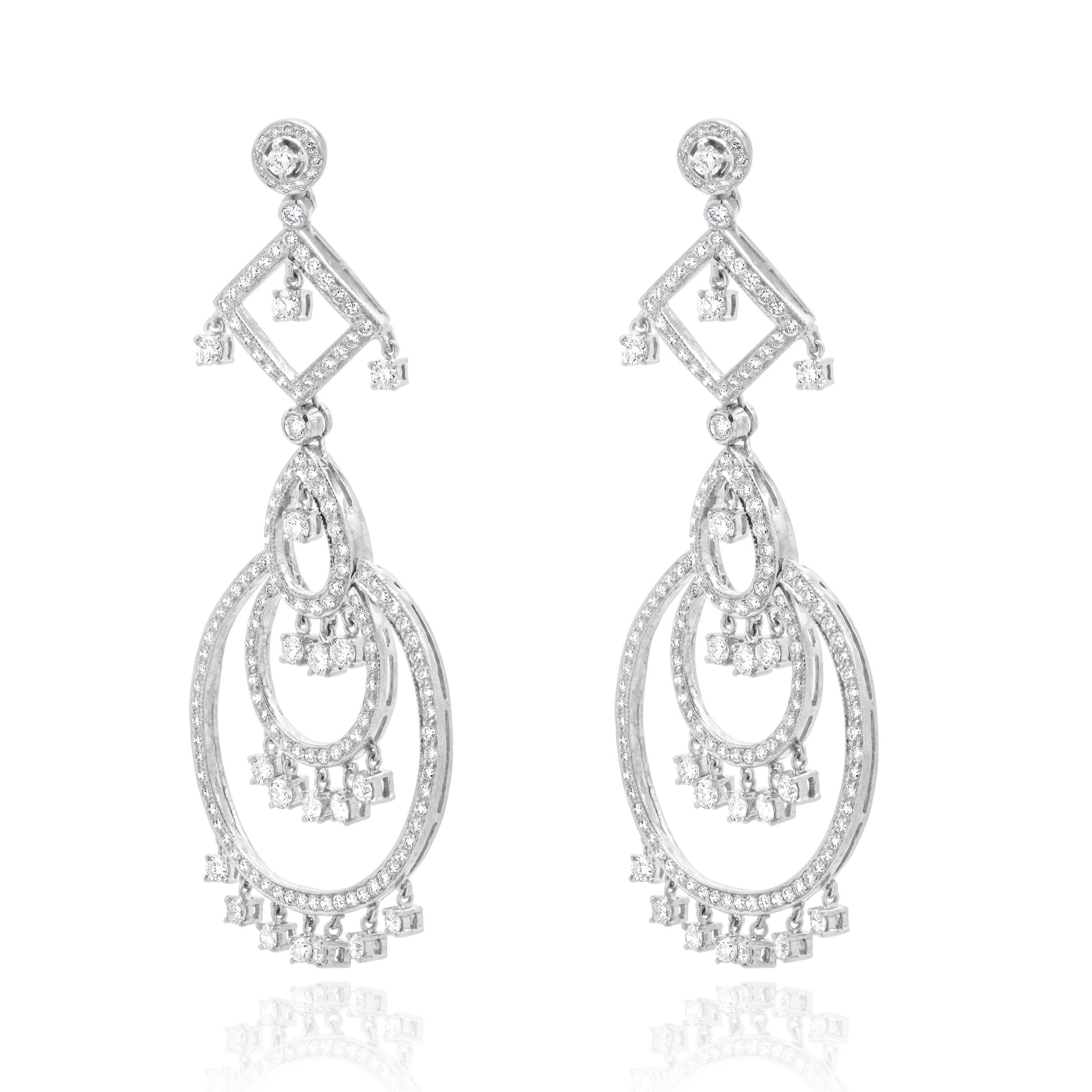 Material: Piranesi
Diamantes: 312 talla brillante redonda = 6,75cttw
Color: G / H
Claridad: SI1-2
Dimensiones: los pendientes miden aproximadamente 73,5 mm de longitud
Cierres: traseros de fricción
Peso: 23,78 gramos
