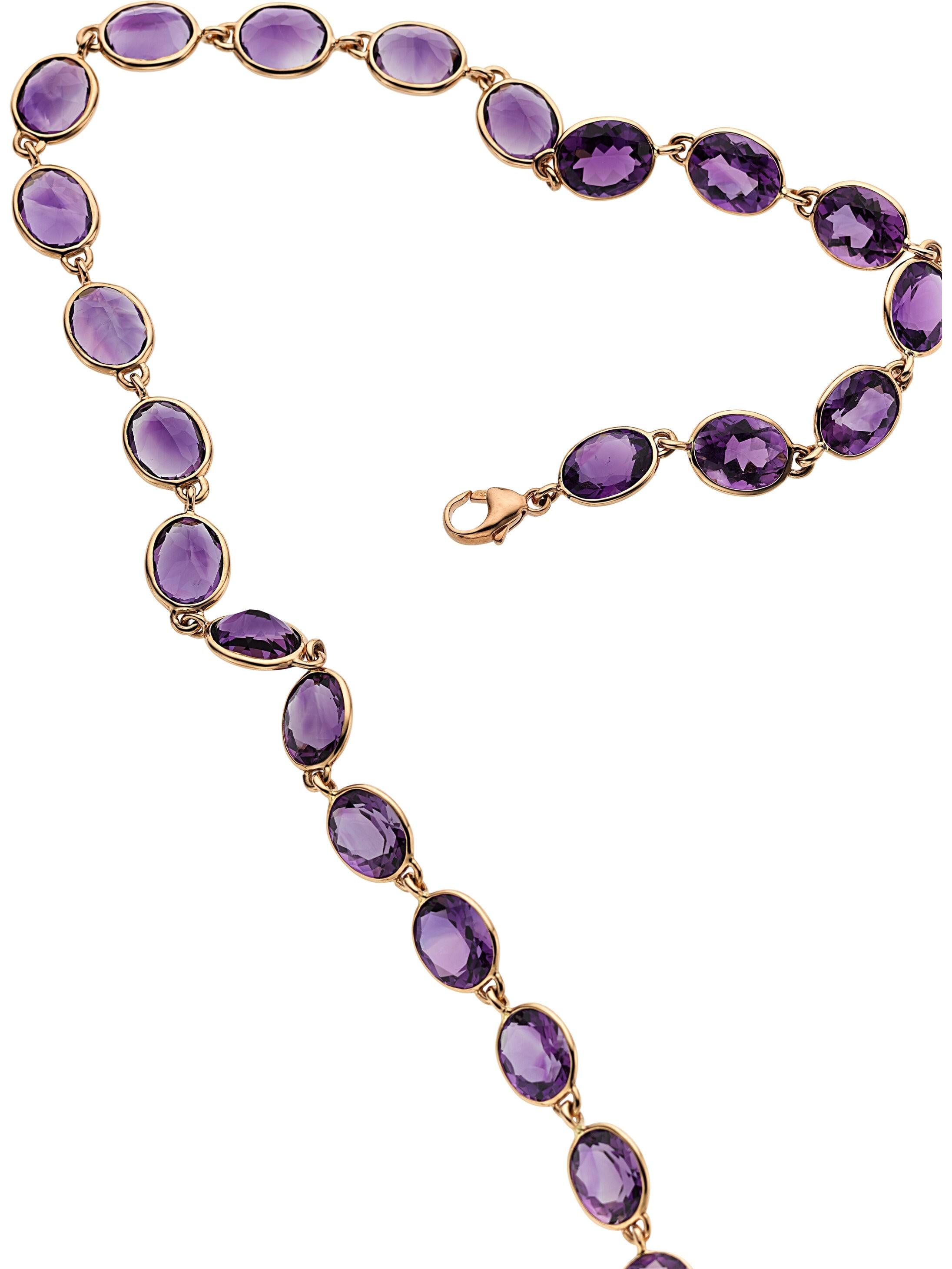 Features 148.02 carats of Oval-Shaped Amethyst
Set in 18k Rose Gold
Gross Weight: 52.20 grams
Length: 36 inches
Overall Condition: Very Good. Shows minimal signs of natural use and wear. Marked 