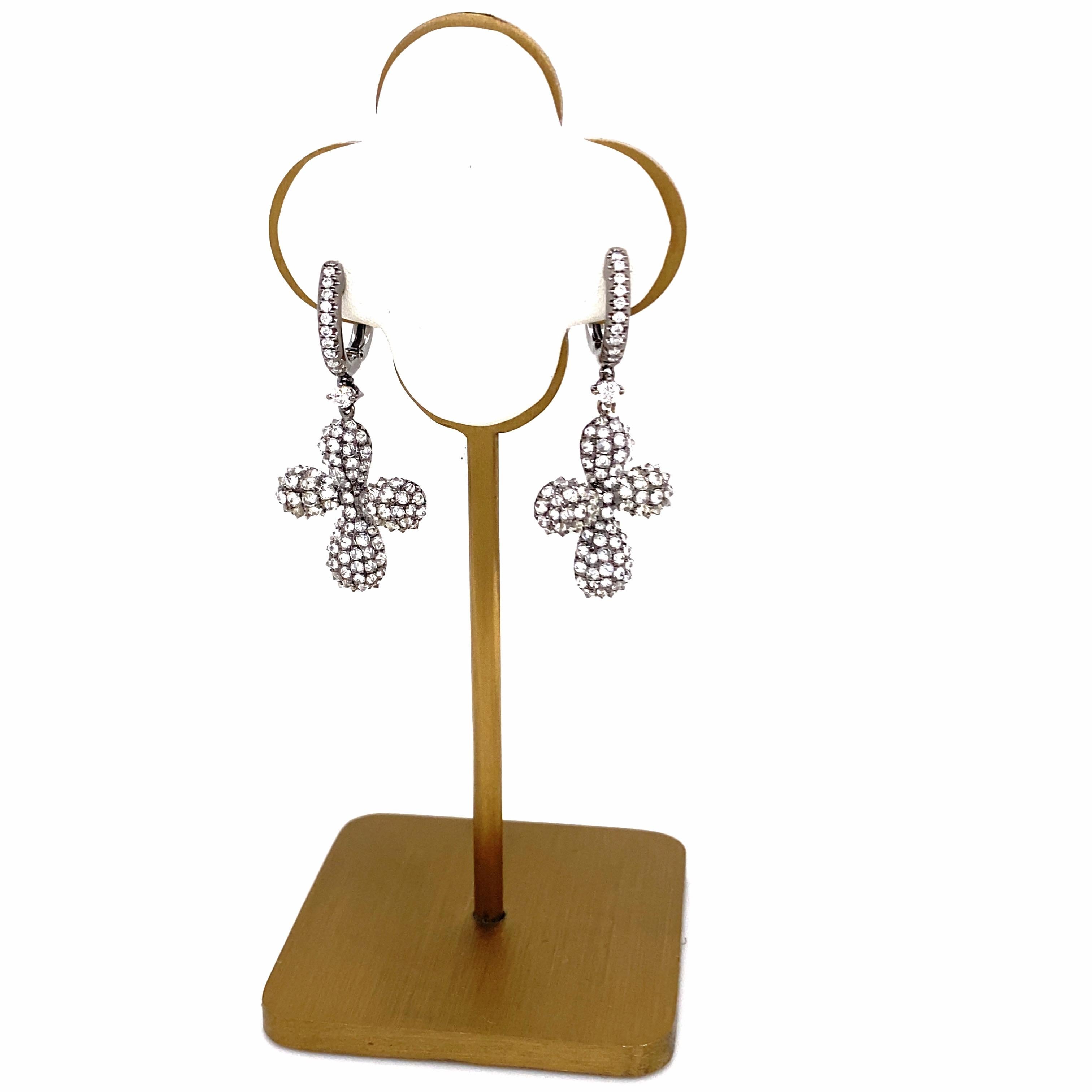 PIRANESI Diamond Cross Drop Earrings
Style:  Drop
Metal:  18kt Black Gold
Size:  1.25' Inches Length
TCW:  2.31 tcw
Main Diamond:  Round Brilliant Diamonds 
Color & Clarity:  White Near Colorless - Slightly Included
*** Diamonds are set upside down