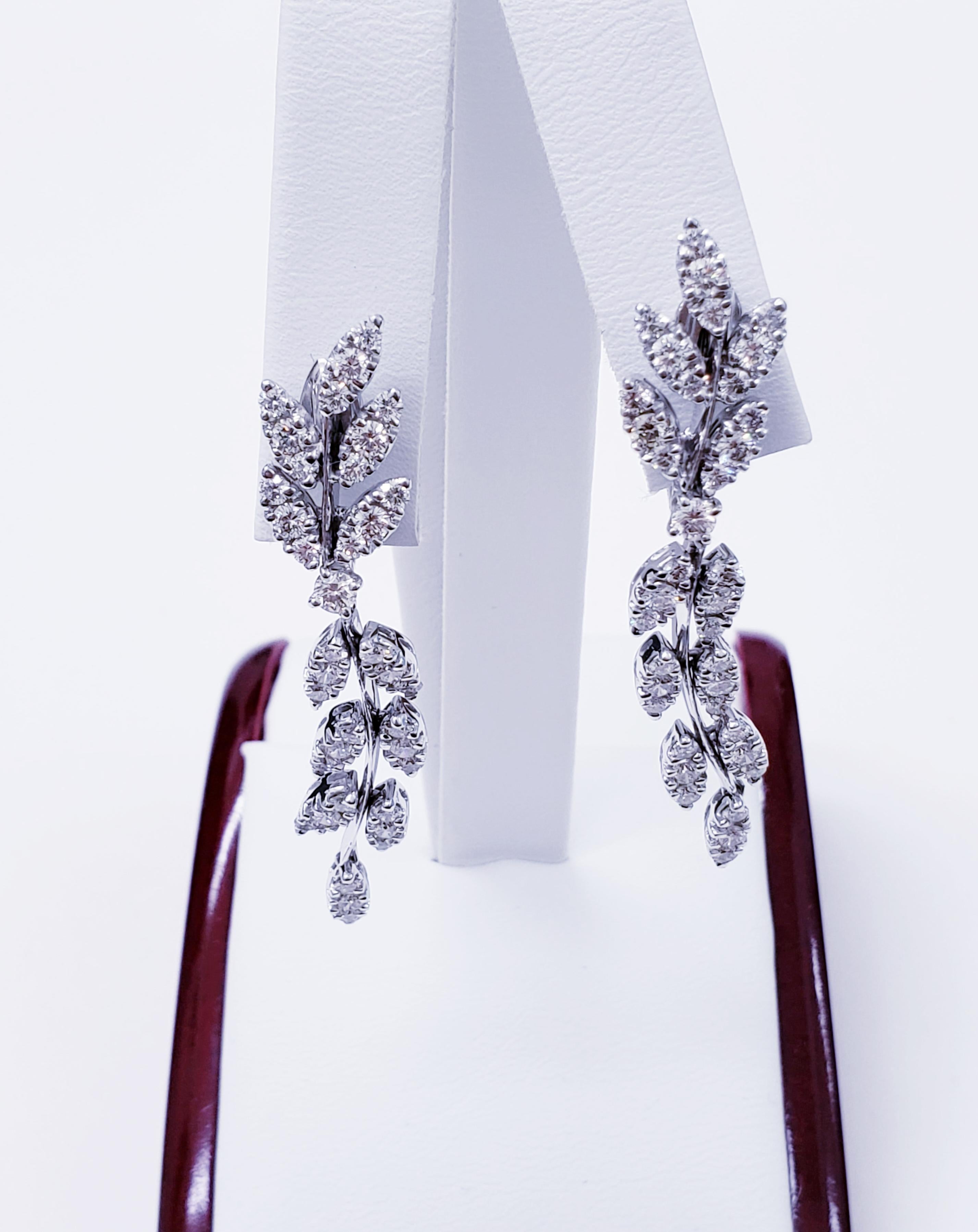 Modern Designer Piranesi diamond leaf earrings in 18k white gold featuring 8tcw (total carat weight) round diamonds. Beautiful deign by world renowned brand Piranessi known for making custom jewelry pieces for the royal families from decades ago.