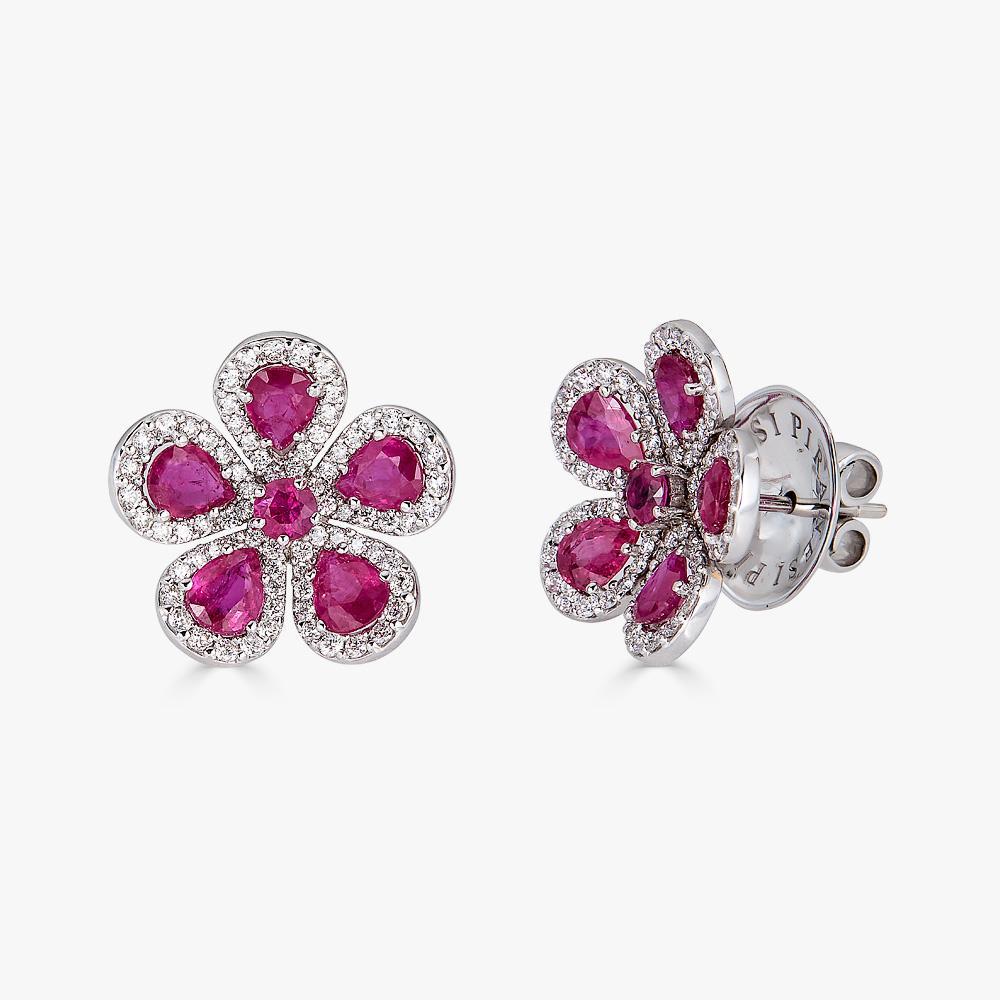 Piranesi classic flower earrings in 18K white gold with ruby and white diamond

Stud Earrings in Ruby and Diamond set in 18K White Gold

Round ruby
1.04cts round white diamonds
Earring with posts only
Earring measures: 18mm x 18mm
Mouse-tail