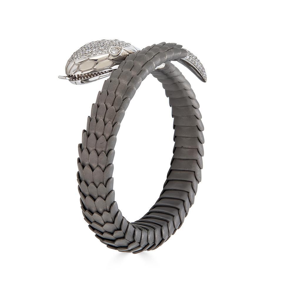 Piranesi Mamba Armband aus 18 Karat Weißgold mit Titaniumschuppen und Diamanten

2,51 Karat runde Diamanten
Armband aus 18-karätigem Weißgold mit Titaniumschalen

Haftungsausschluss:
Bitte beachten Sie: Alle Karatgewichte sind ungefähre Angaben und