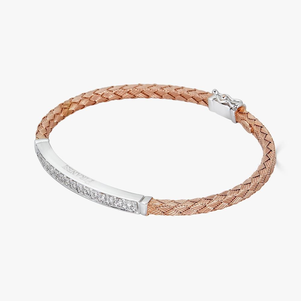 Piranesi Oro Braided bracelet with 18K rose gold with round white diamonds

Satin Finished Braided Bracelet with Diamonds set in 18K Rose Gold
0.38ct round white diamonds
Clasp closure

Disclaimer:
Please note: all carat weight is approximate and