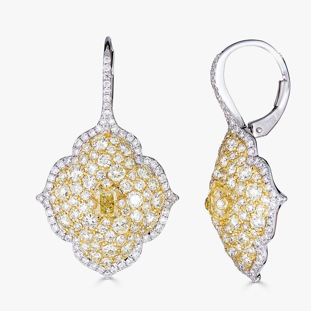 Piranesi Pacha on wire earrings in 18K white gold with 3.21cts yellow diamonds

Hanging Earrings in Yellow and White Diamonds set in 18K White and Yellow Gold

3.21cts cushion and round yellow diamonds
0.68ct round white diamonds
Earring measures: