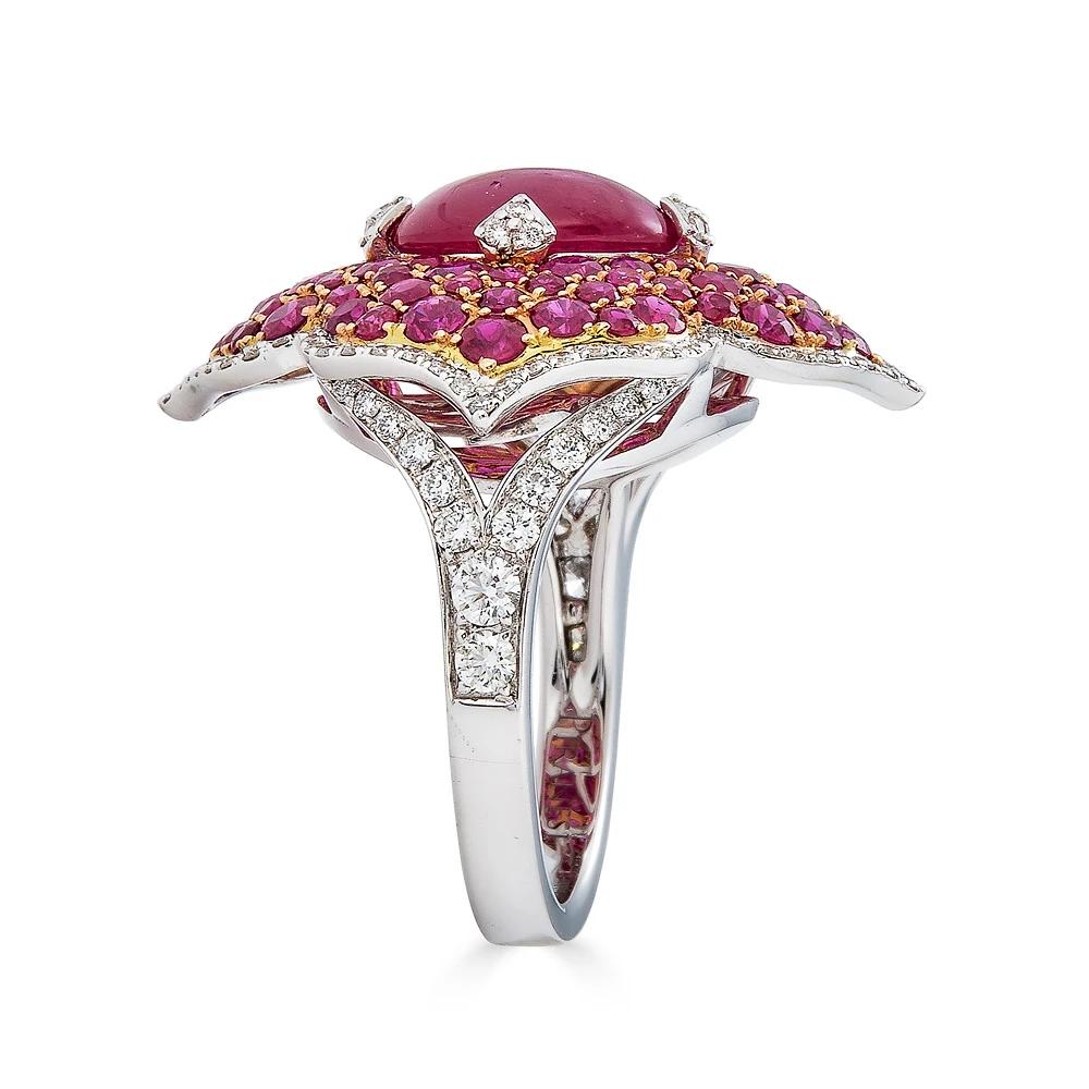 Piranesi Pacha ring with 3.71 carats Cabochon Ruby and Diamonds

3.71 carats Cabochon Ruby
2.91 carats Round Ruby
0.77 carats Round Diamond
Ring set in 18 White and Rose Gold

Disclaimer
Please note: all carat weight is approximate and may vary