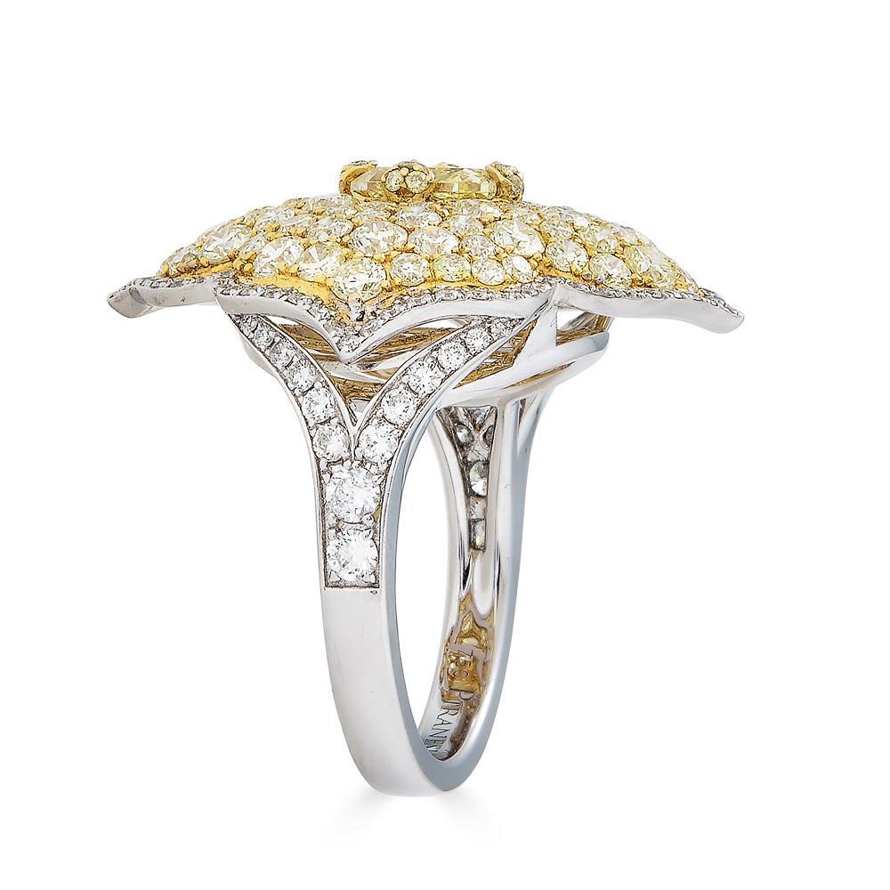 Piranesi Pacha yellow diamond ring

1.07 carats Yellow Radiant Diamond center
2.81 carats Round Yellow Diamonds
0.69 carats Round White Diamonds
Ring set in 18K White and Yellow Gold

Disclaimer
Please note: all carat weight is approximate and may