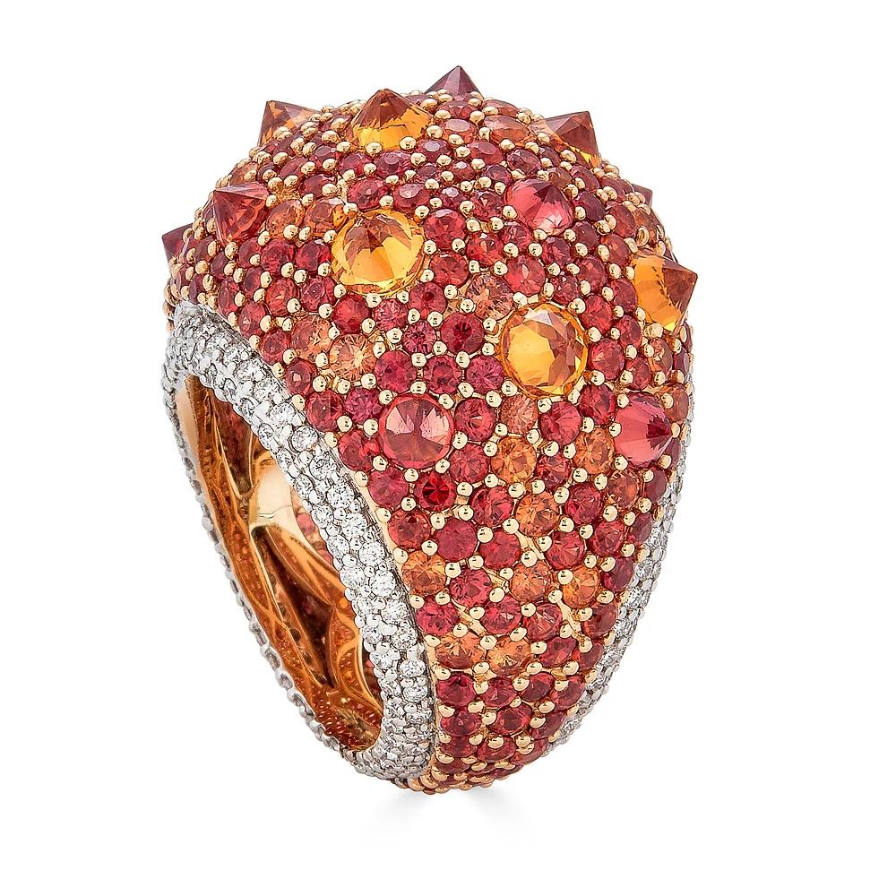 Piranesi reverse set Rhapsody ring with 12.88 orange sapphire

Round Orange Sapphire 12.88
Round Diamond 1.05
18K White and Rose Gold
Size 6 1/2

Disclaimer
Please note: all carat weight is approximate and may vary slightly. Colors may appear