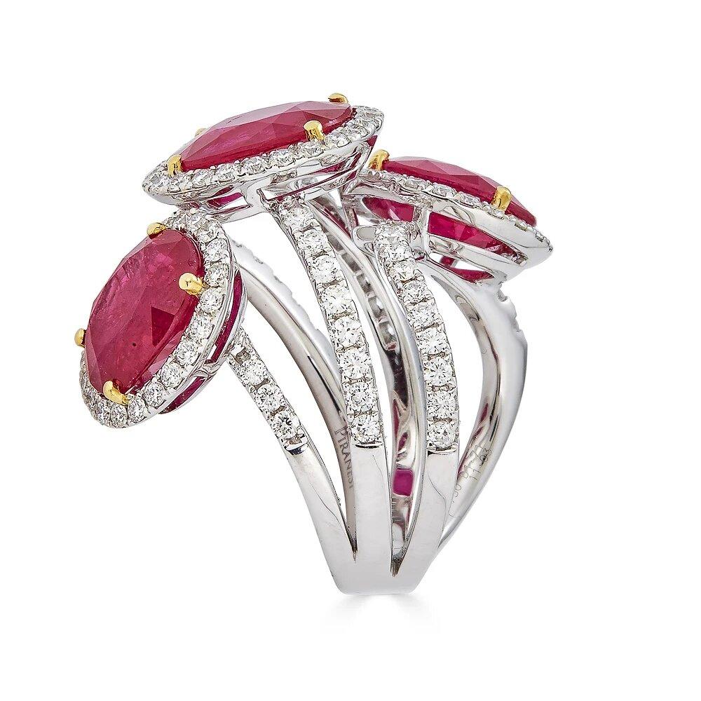 Piranesi three stone ring with ruby and diamond

11.03 carats Oval Ruby
1.72 carats Round Diamonds
Ring set in 18K White Gold
Size 6.75

Disclaimer
Please note: all carat weight is approximate and may vary slightly. Colors may appear different in