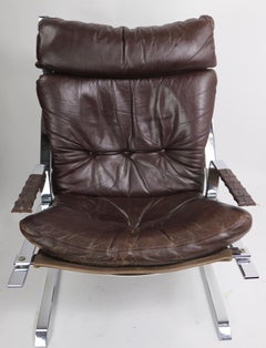 Pirate Chrome and Leather Lounge Chair and Ottoman