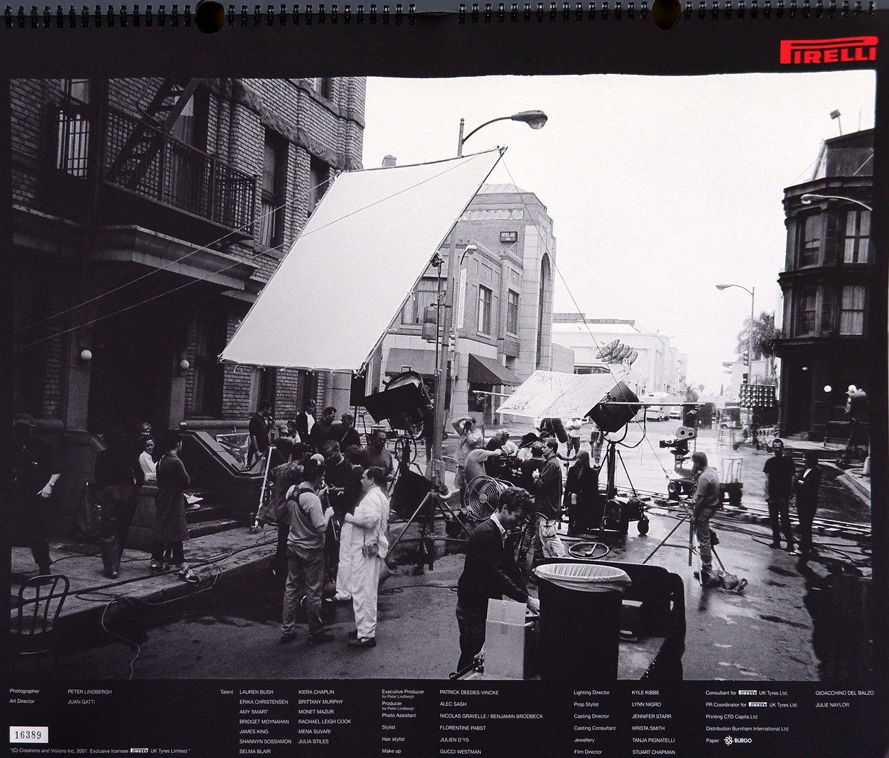 Pirelli Calendar 2002 Shot by Peter Lindbergh in Los Angeles
Photography - Collector's Item - Peter Lindbergh
Measures : ~60cmx47cm 
2002 Pirelli Calendar-Peter Lindbergh's Hollywood, photographed at Paramount's Studio in Hollywood California during
