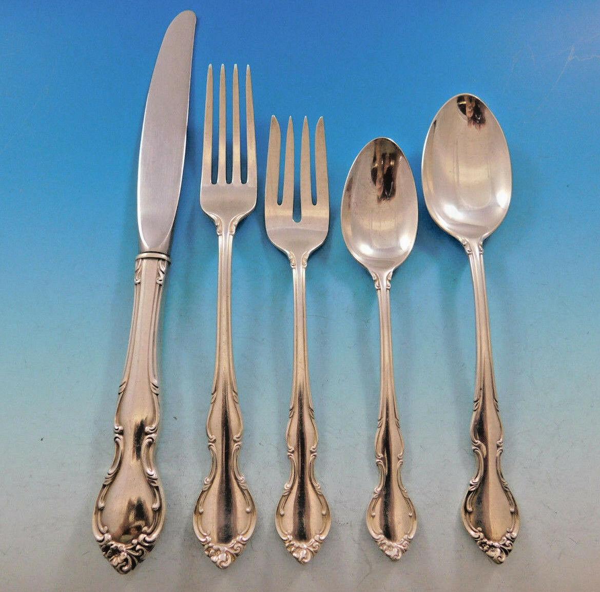 Stunning Pirouette by Alvin sterling silver flatware set - 64 pieces. This set includes:

12 knives, 9 1/4