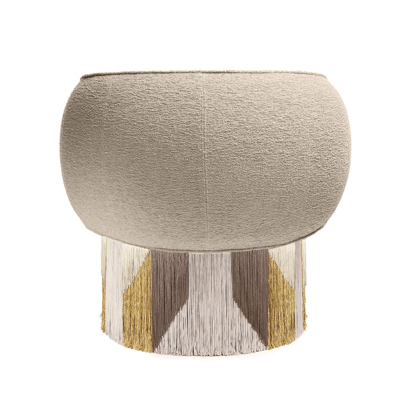 Tribal roots and sartorial references blend in this swivel armchair, a refined artisan piece that will strike with its glamorous silhouette. Covered with beige boucle fabric and featuring a sturdy beech, the enveloping seat flaunts a triumph of
