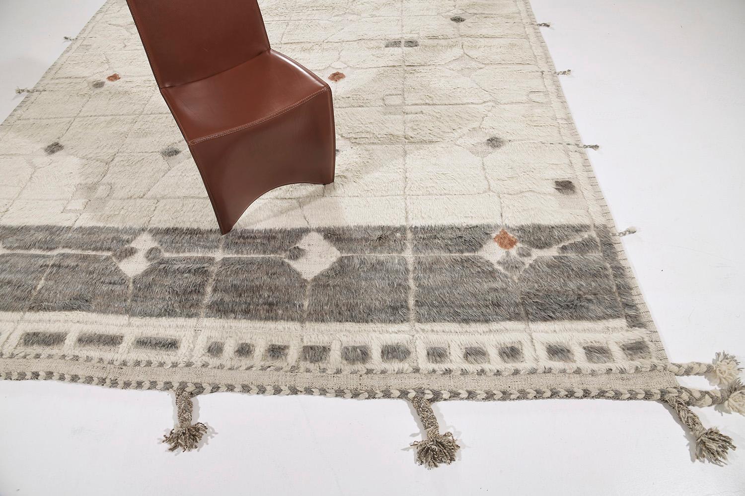 Pirouette is a mesmerizing rug that features a stunning natural color scheme displaying an array of wonderful symbolical motifs. Natural and gray play an integral part in illuminating the rug’s overall majestic appearance. This collection, 'Kust'