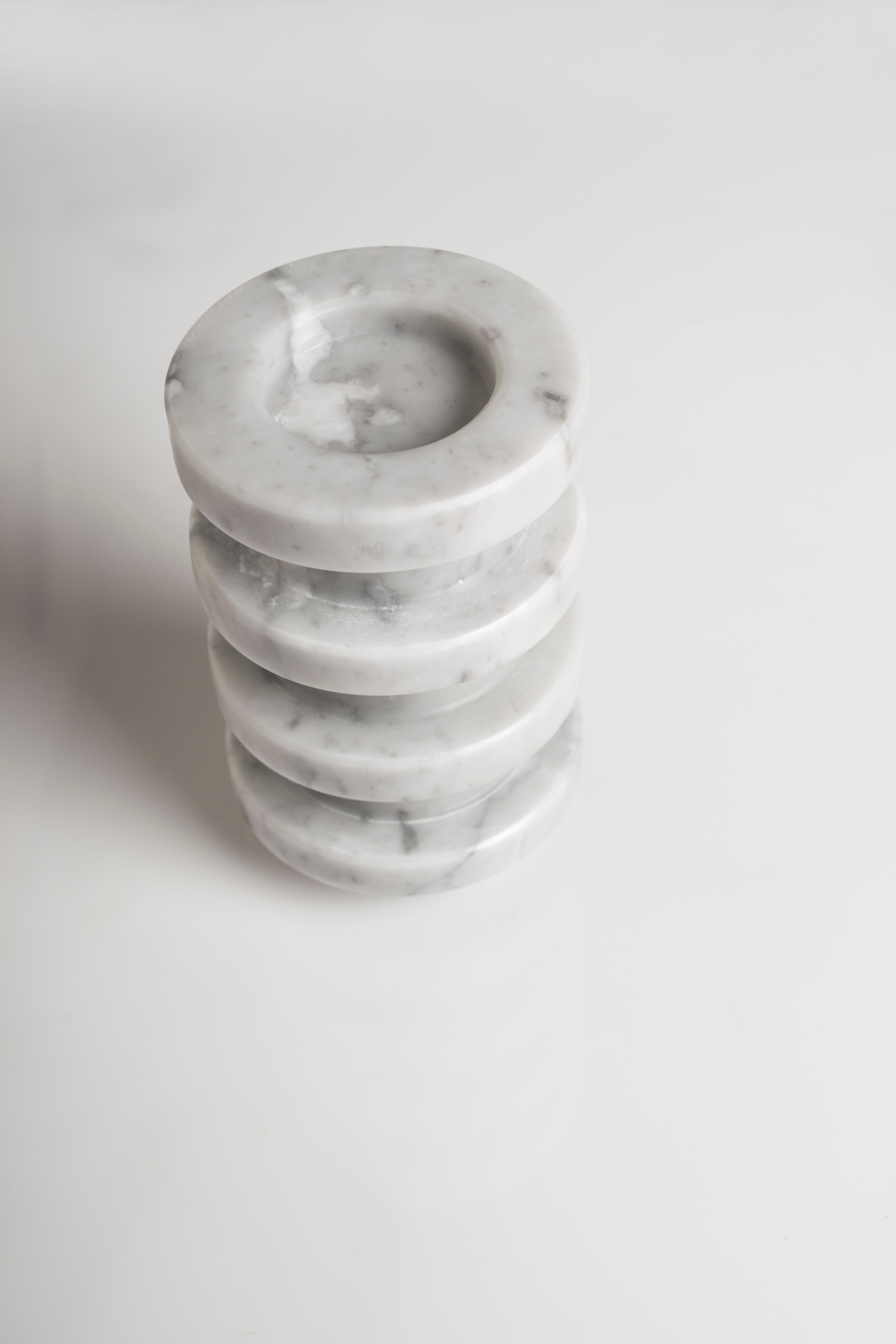 Pisa sculpture by Carlo Massoud.
Handmade. 
Dimensions: D 10 x H 20 cm 
Materials: Carrara Marble

Carlo Massoud’s work stems from his relentless questioning of social, political, cultural, and environmental norms. He often pushes his viewers