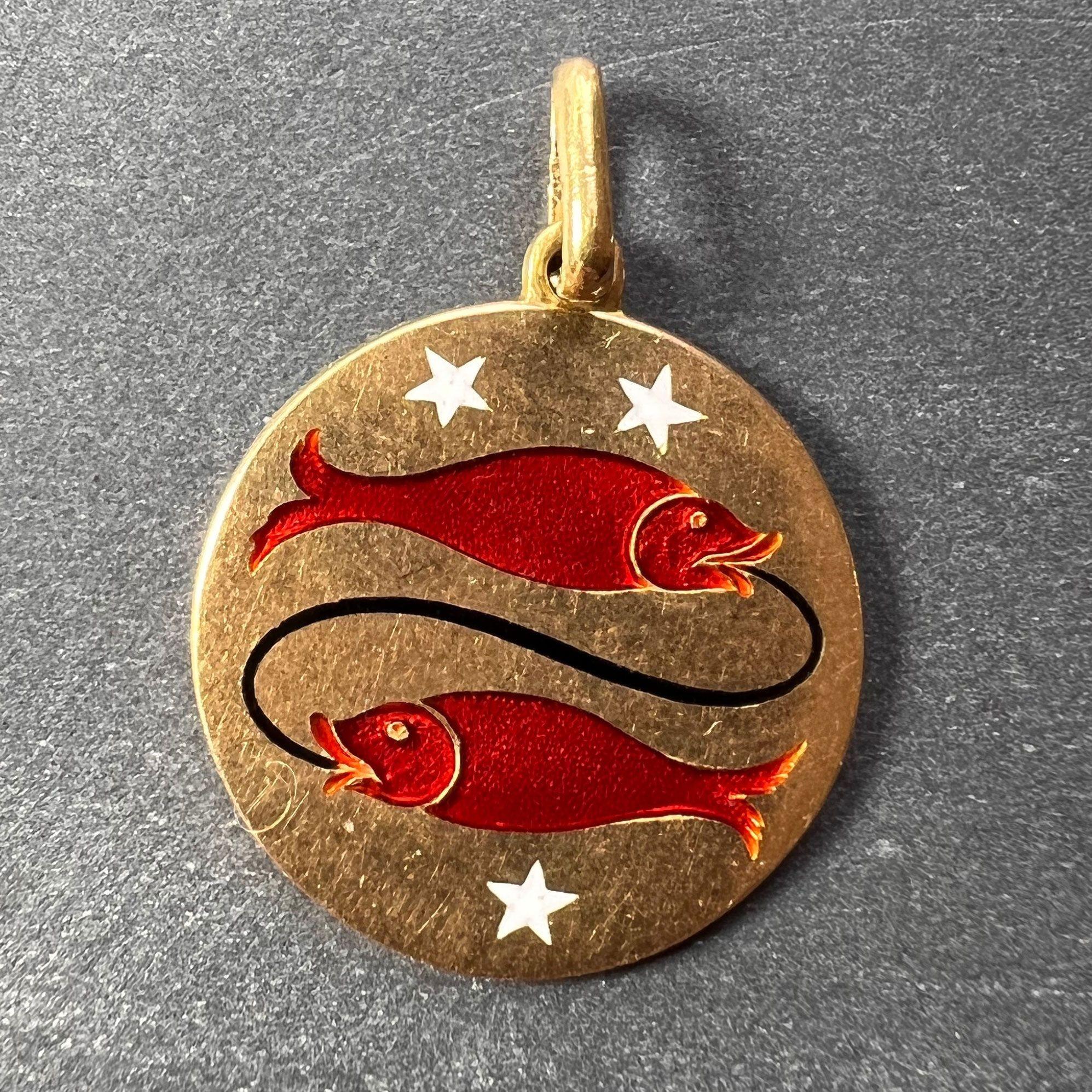 An 18 karat (18K) yellow gold charm pendant designed as the zodiac sign of Pisces depicting two fish and three stars in enamel. Stamped 750 for 18 karat gold and 38MI for Italian manufacture to the reverse.

Dimensions: 2.2 x 1.9 x 0.1 cm (not