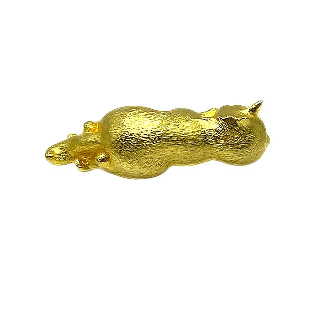 This is a Piscitelli gold-tone metal kitten shoulder pin. This sweet kitten has black enamel eyes. Stamped Piscitelli inside of pin. The shoulder pin was popular in 1980s fashion. Taking this kitten with you to parties will create