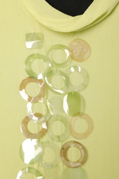 Pistachio green chiffon dress with plastic embellishment