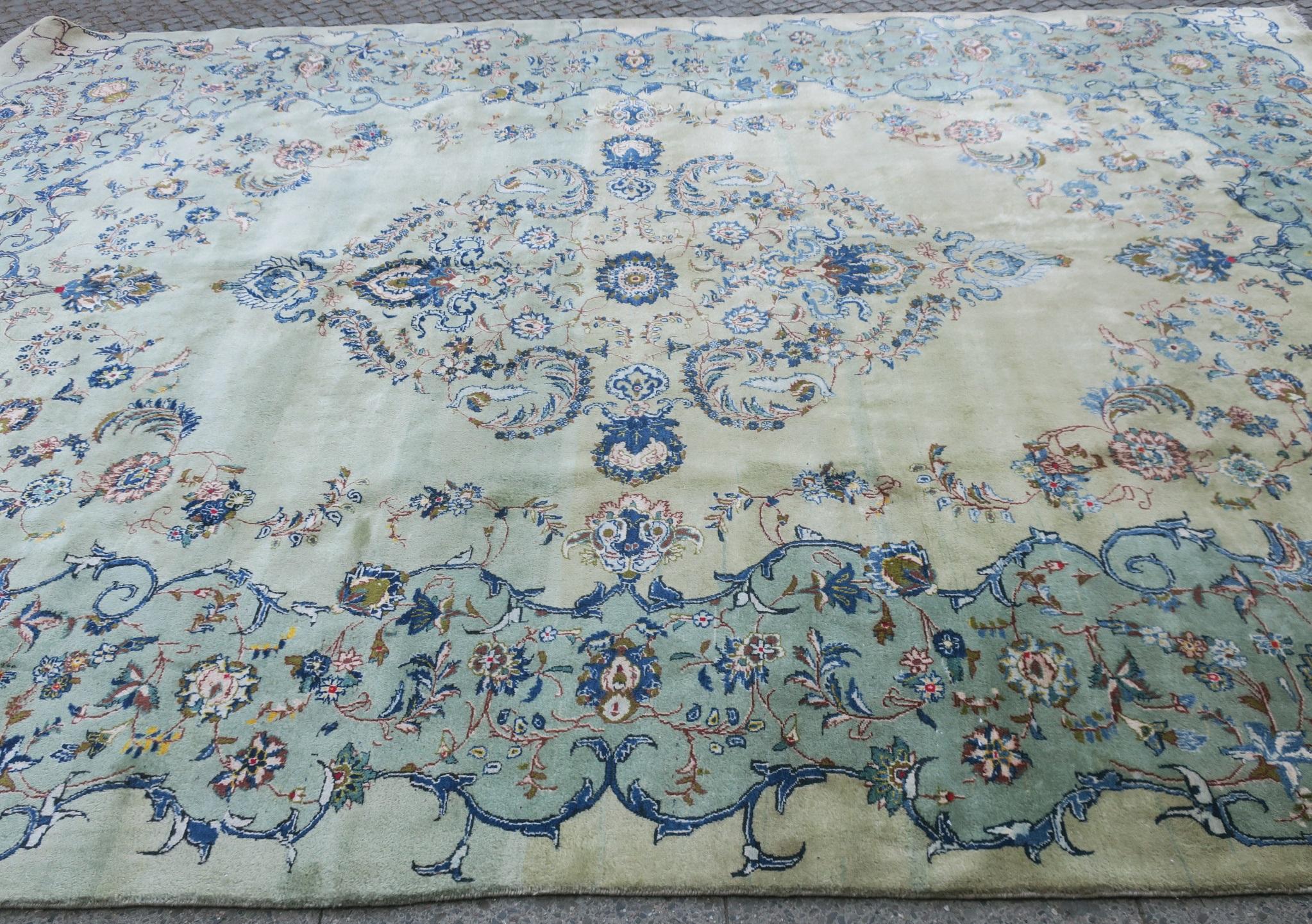 Large Pistachio Kashan carpet from circa 1950-1970 made with lustrous high quality wool and subtly shaded light pistachio background color framed by a slightly darker pistachio surround.
Very good pile all-over.
The rug has been professionally