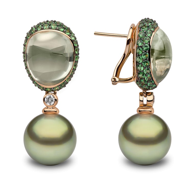 These unique earrings by Yoko London feature a lustrous Pistachio coloured Tahitian pearl beneath a mesmerising Green Amethyst. Set in warm 18 Karat Rose Gold to enrich the hue of gems. These stunning earrings exude a captivating elegance, a perfect