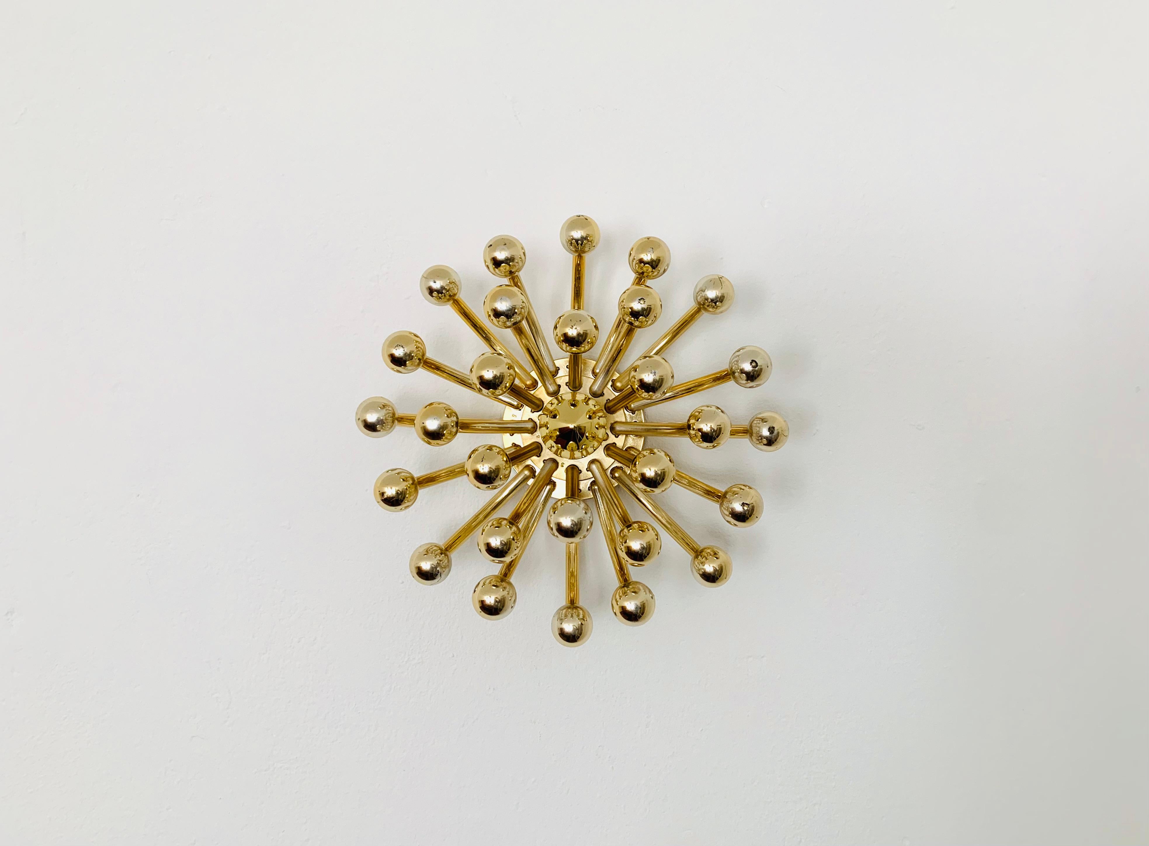 Spectacular wall or ceiling lamp from the 1960s.
The design creates a fantastic play of light and enchants every room.

Design: Studio Tetrarch
Manufacturer: Valentin Luce

Condition:

Very good vintage condition with signs of wear consistent with