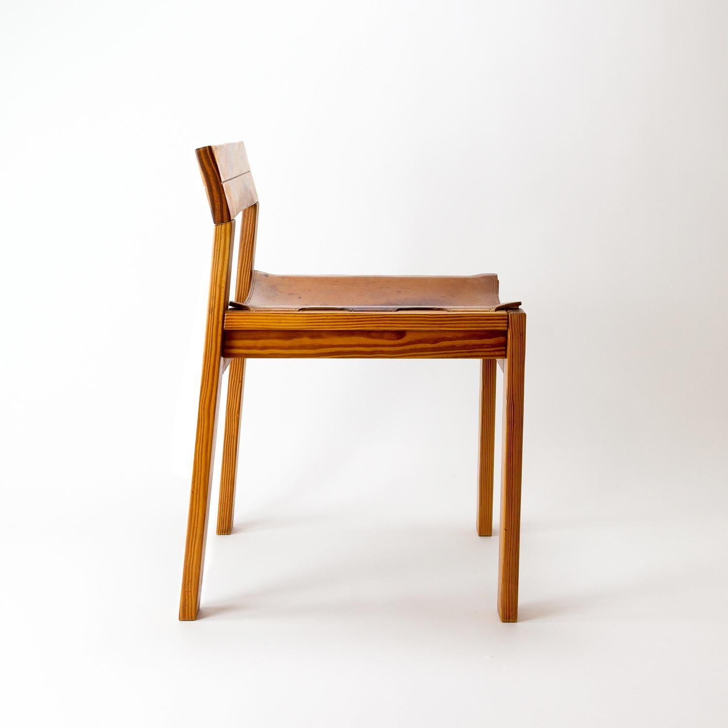 A 1970s pine and cognac leather side chair from Denmark. Great grain in the pitch pine and the cognac butt leather shows beautiful patina. An unusual and useful chair.

  