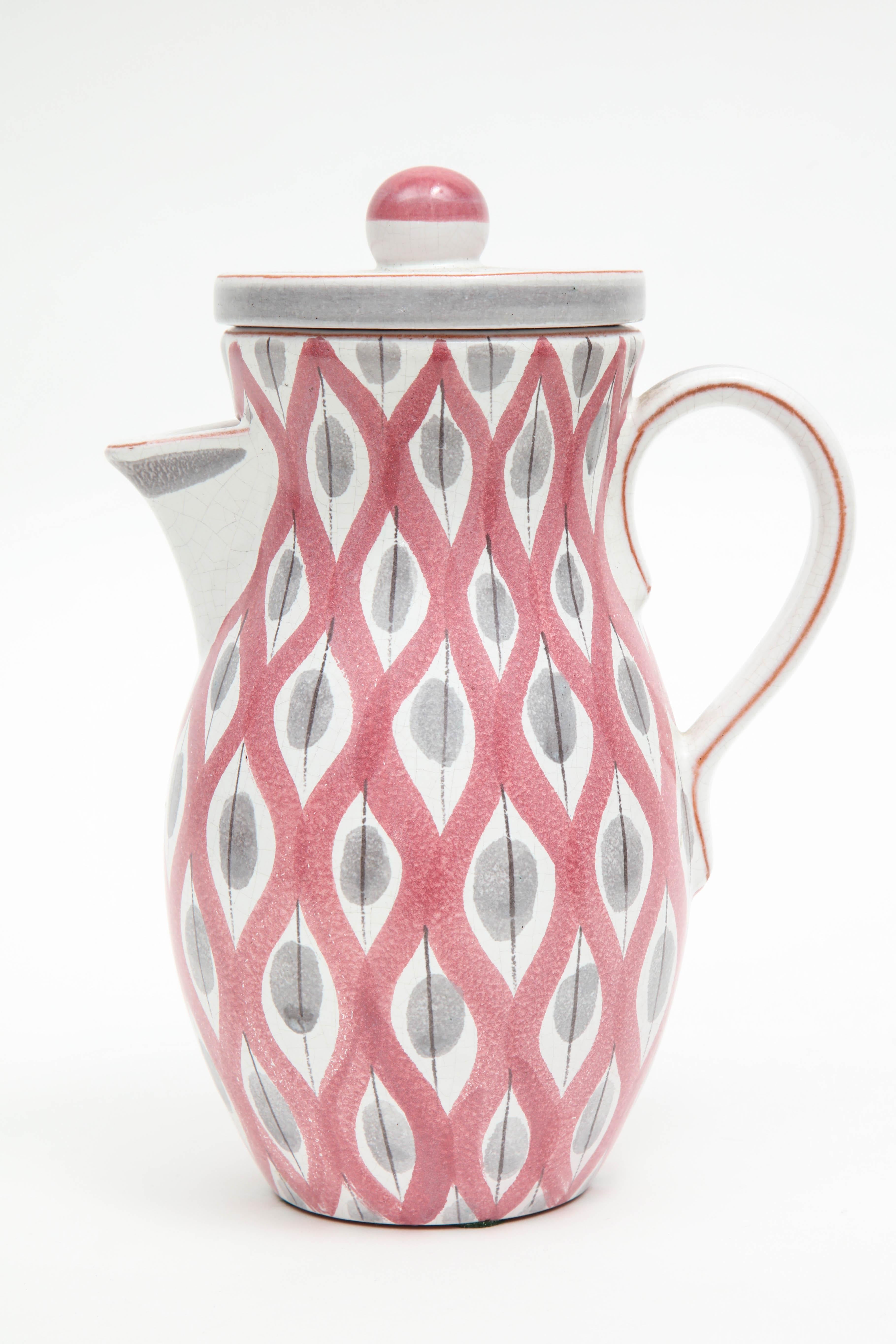Decorative pitcher by Stig Lindberg, Sweden, circa 1950, by Gustavsberg.
An artistic jack-of-all-trades, Stig Lindberg was accomplished in industrial design, textile design, painting, illustration, glassblowing and ceramics. His whimsical postwar