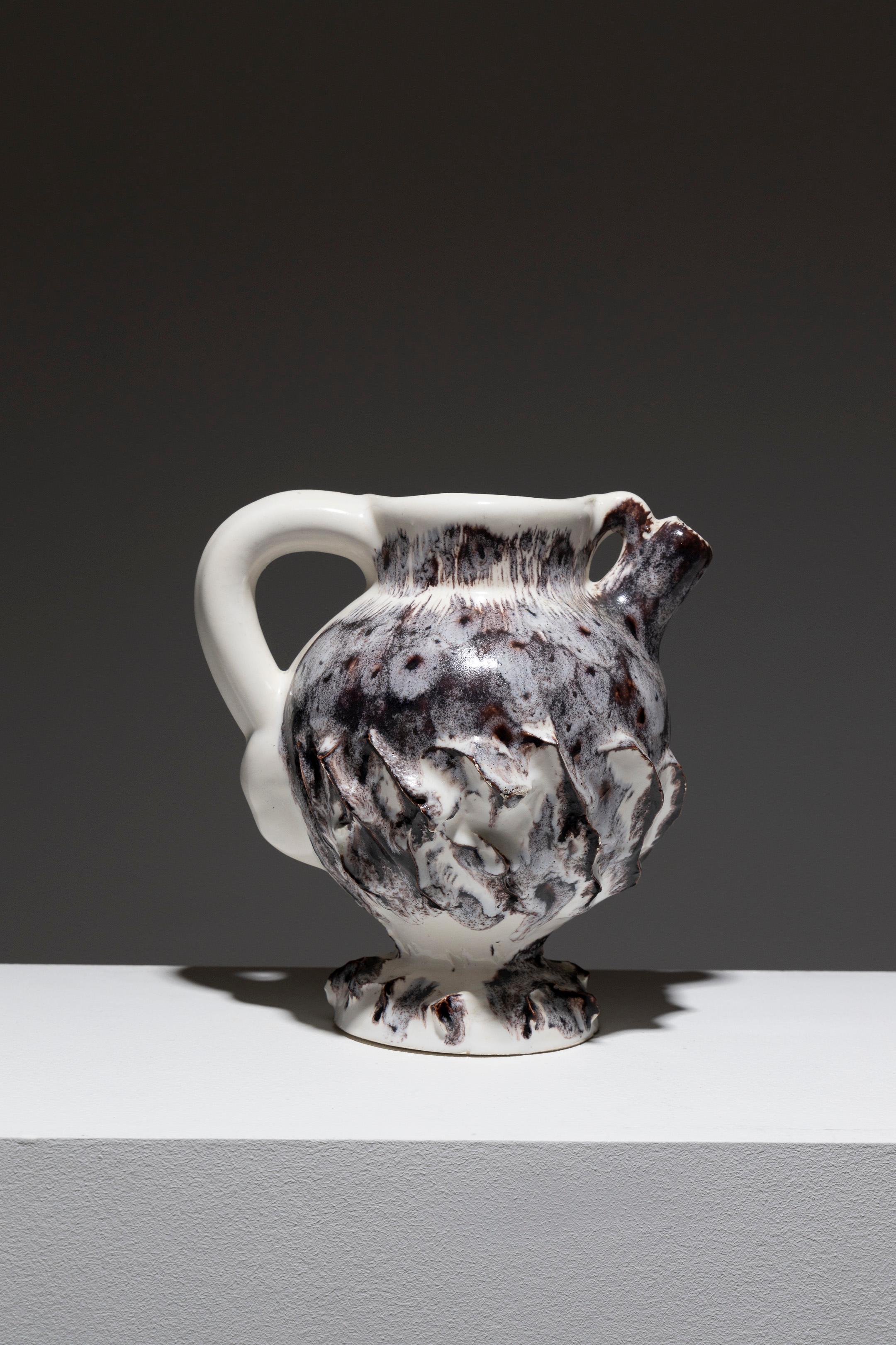 Small 'Bird' Pitcher in Faience, Vallauris, 1990s. Textured with layered glazing, creating a feather-like effect. Very good condition.
DV1554