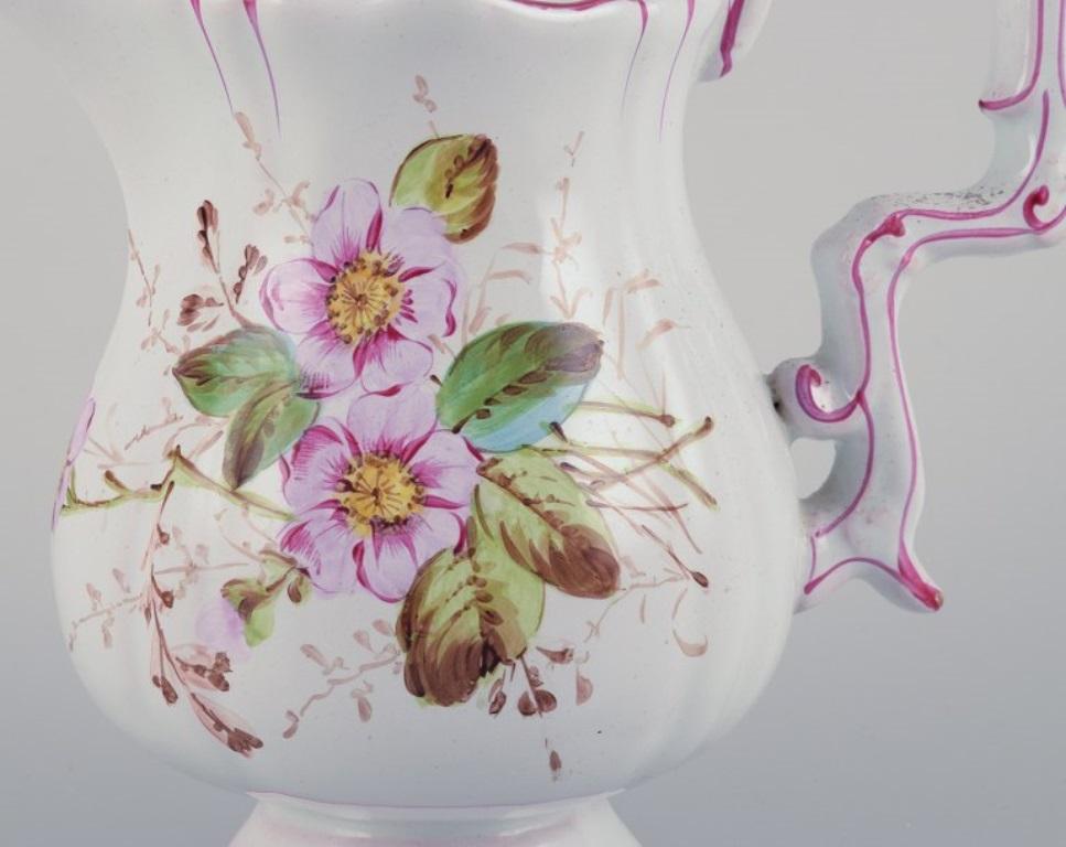 Pitcher in faience with motifs of flowers and insects. Style of Emile Gallé In Good Condition For Sale In Copenhagen, DK