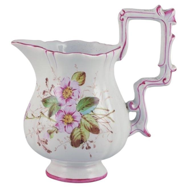 Pitcher in faience with motifs of flowers and insects. Style of Emile Gallé For Sale