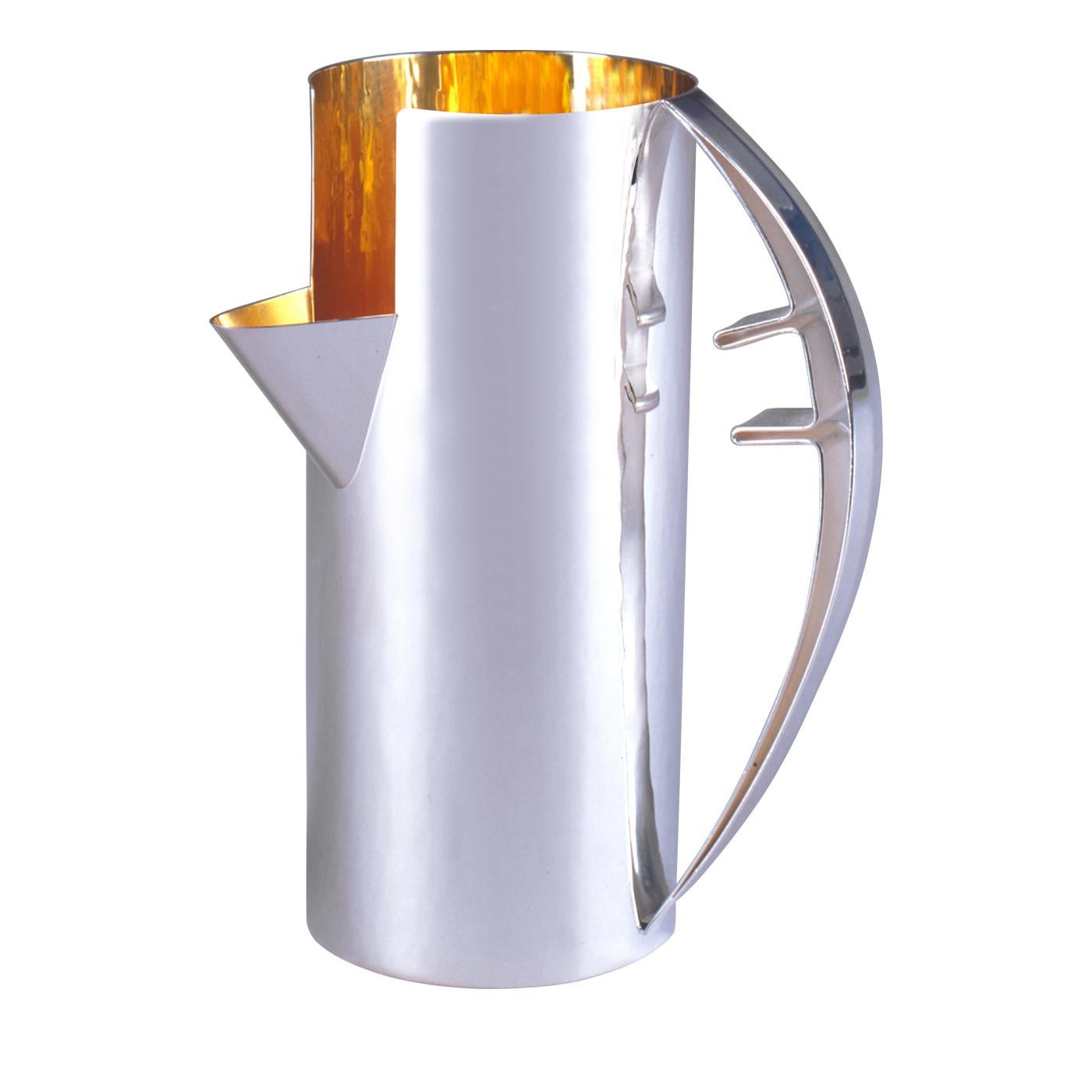 This pitcher will make an exemplary addition to any tableware collection. It is crafted entirely in pure 925 silver, which has been plated in gold on its interior. It features a large curved handle and a deep set spout, allowing for easy pouring.