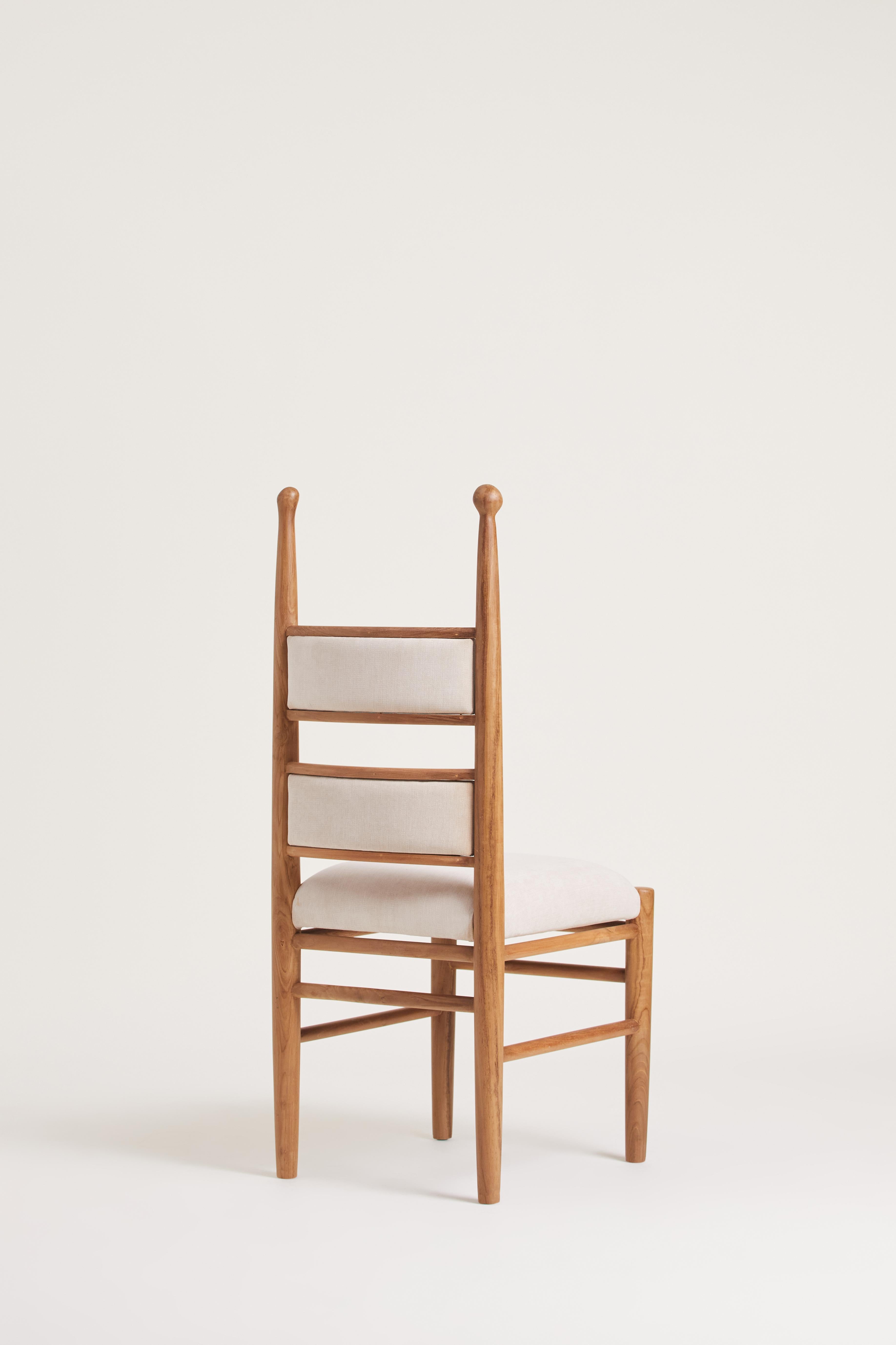 Discover the evolved Pitufi Dining Chair – now Upholstered, a refined masterpiece. This new edition enhances the beloved design with the warmth and luxurious touch of upholstery, offering unmatched comfort and elegance. Retaining the iconic upright