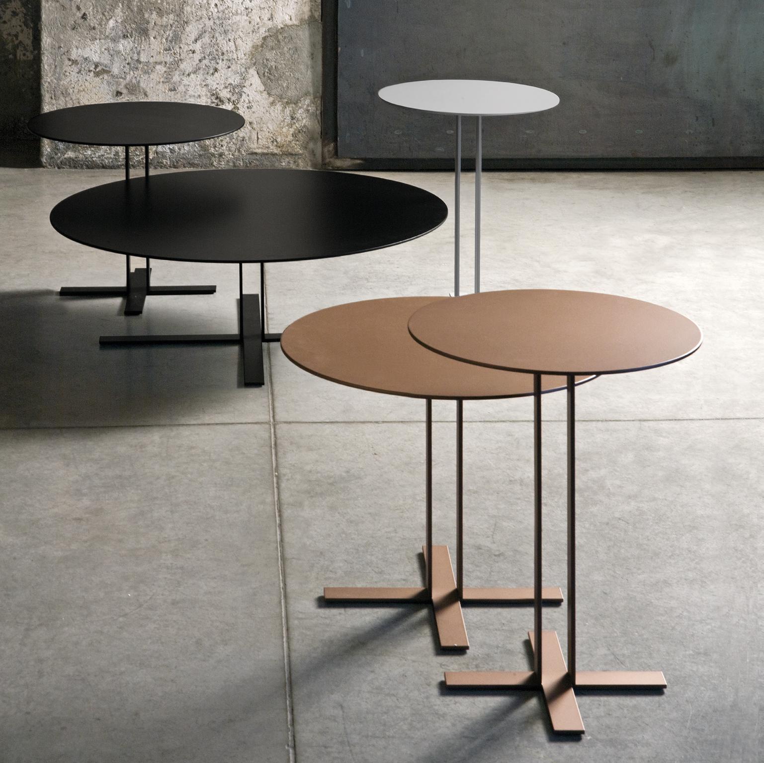 A light, crisp and stylish table with a strong, clean design and an elegant, dainty spirit. Metal base and MDF top. Available in a matt lacquered finish.

The designer Giuseppe Viganò is dedicated to the industrial design of furniture products and