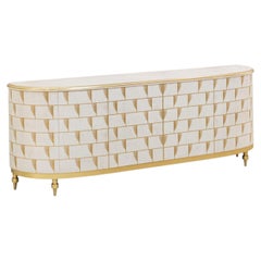 Buffet Piuma blanc et or avec pieds en laiton