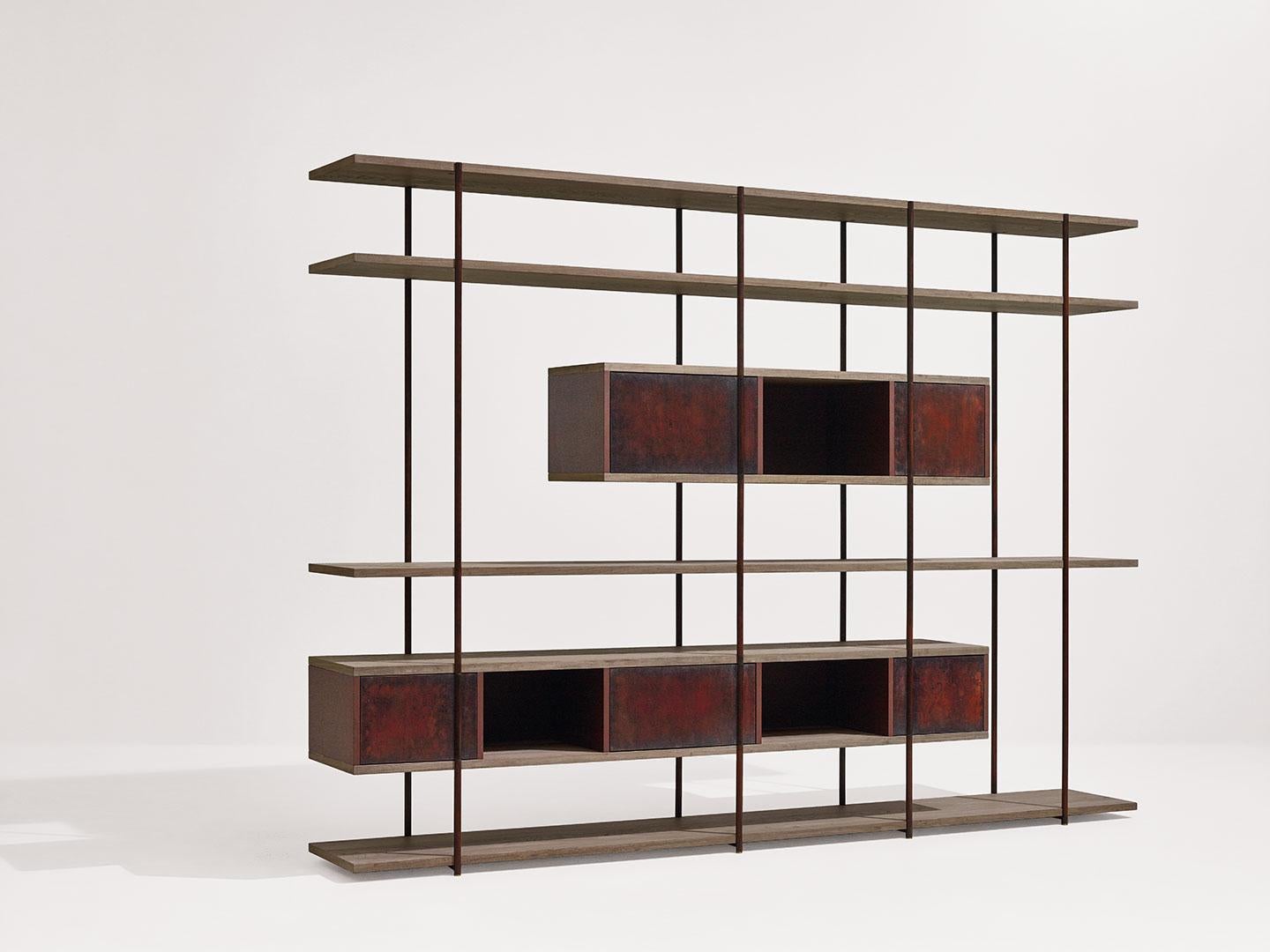 Pivot bookshelf by SEM.
Dimensions: W 278 x D 38 x H 203 cm.
Material: metallic tubolar structure, pivoting doors in surface in antique brass or patinas, shelves in fossil elm or canaletto walnut, side and back panels in matt
painted MDF.