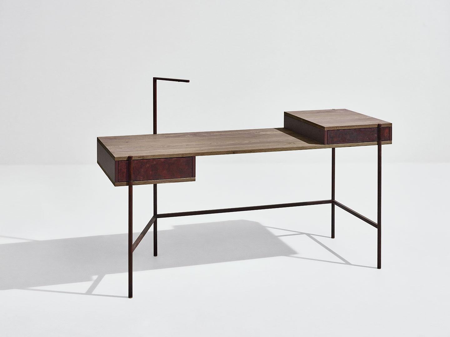 Pivot Desk by SEM
Dimensions: W150 x D57 x H72 cm
Material: metallic tubolar structure, pivoting doors in surface in antique brass or patinas, shelves in fossil elm or Canaletto walnut, Side and back panels in matt
painted MDF. 
Available in