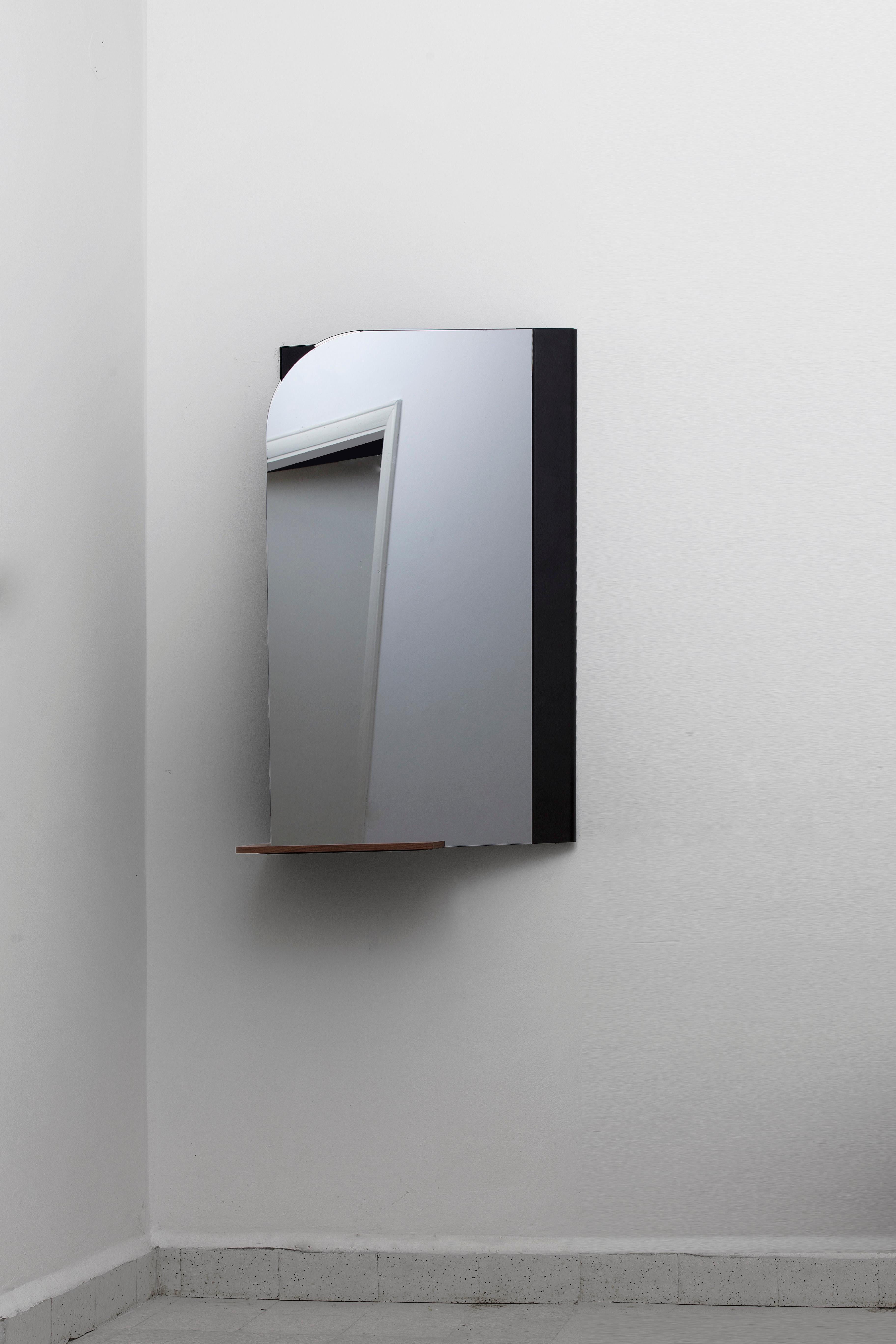 Pivot medium mirror by Borgi Bastormagi
Dimensions: 25 x 60 x 100 cm
Material: steel, mirror, walnut wood

Pivot -M- is a variation of the full height mirror, designed to revisit the conventional console.

Wall mounted, Pivot -M- is ideal for