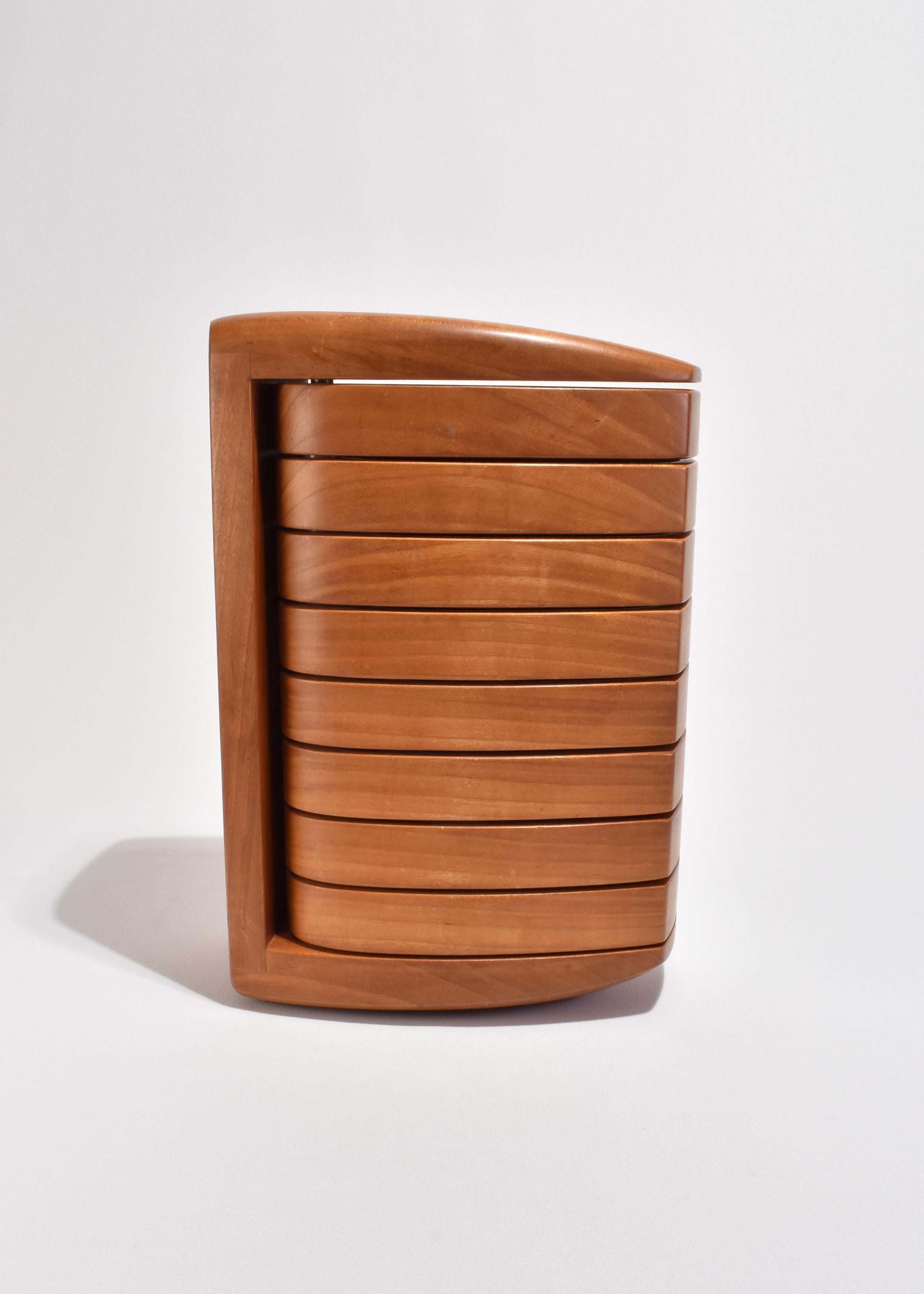 Large, handmade sculptural wooden jewelry box with eight pivoting compartments lined in grey suede. Signed on base, Kellam '90.